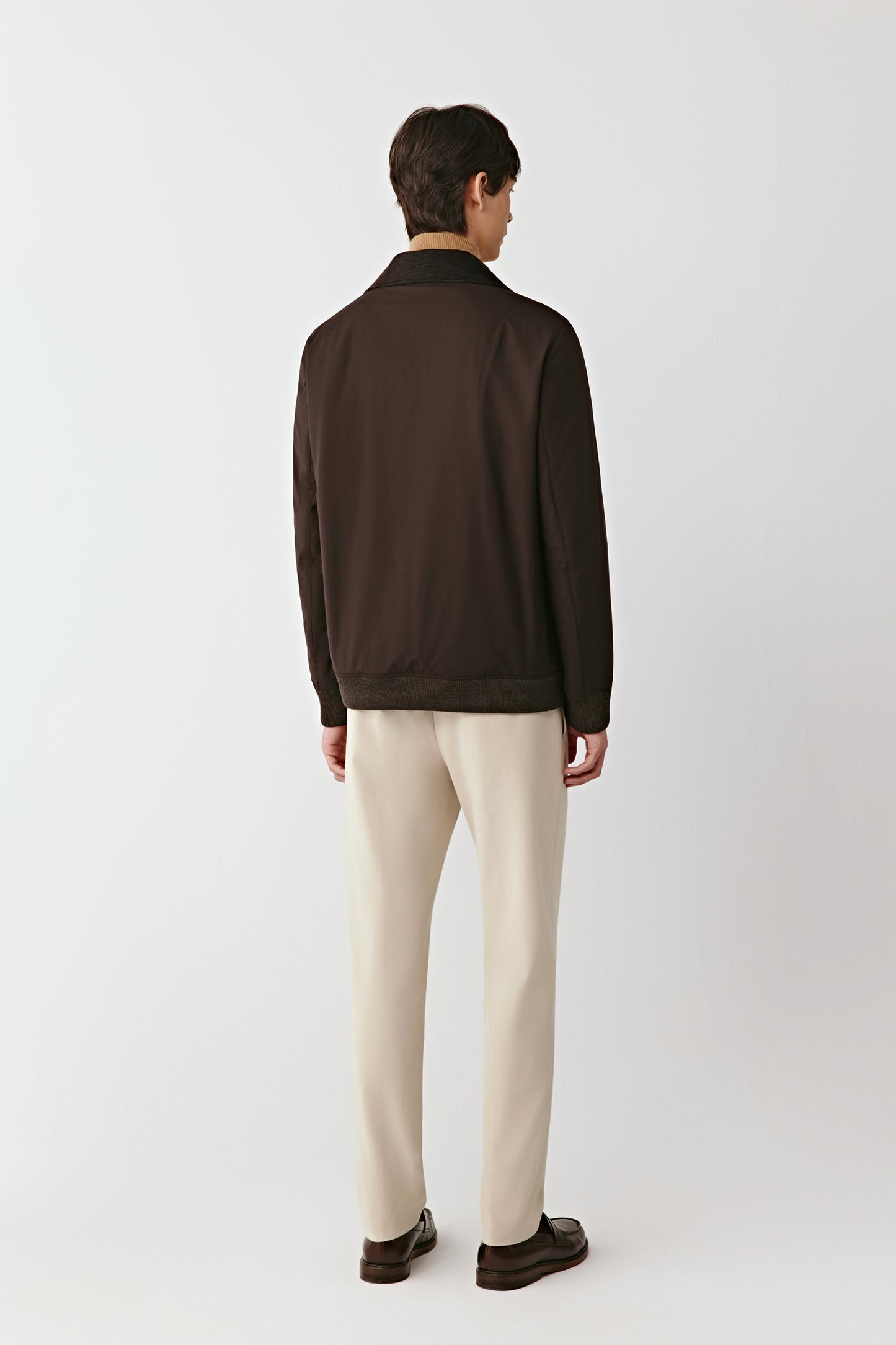 Back view of the wool and yak jacket, showing the clean seam lines and soft drape of the fabric.