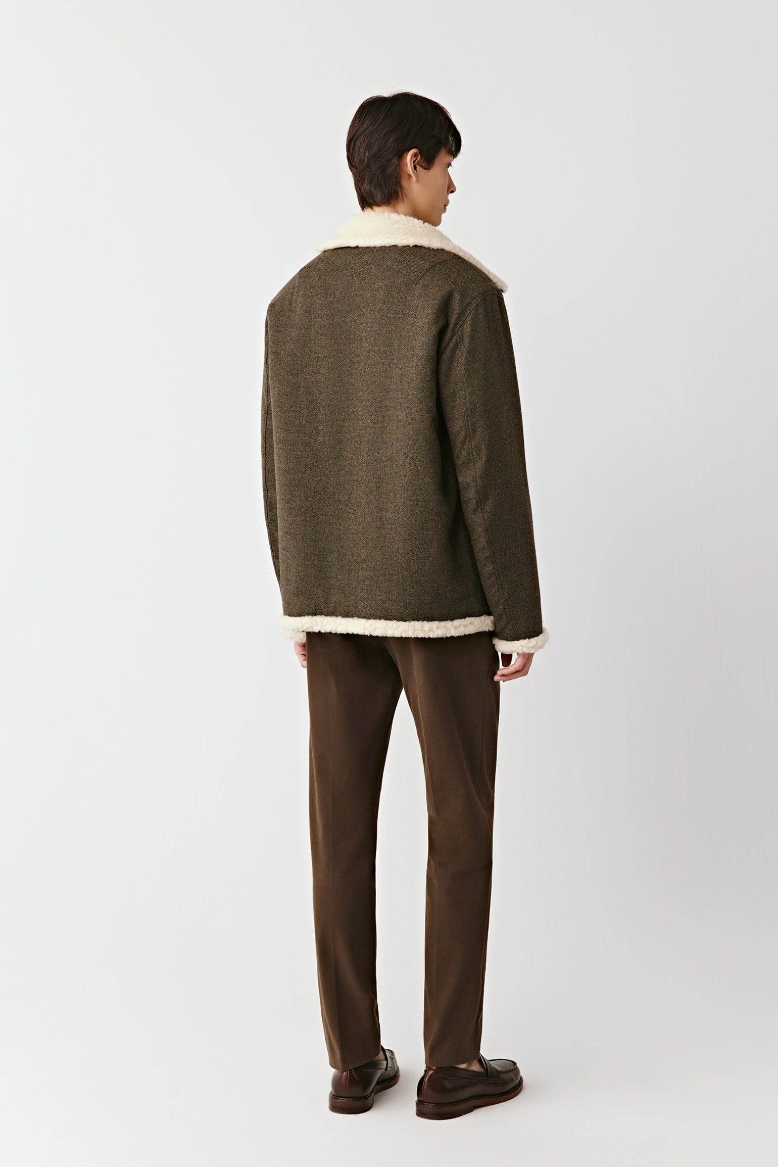Back view of the wool and cashmere jacket, highlighting the neat seams and clean tailoring.