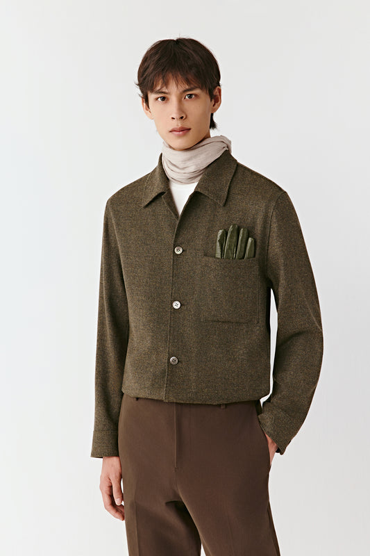 Three-quarter side view of the wool and cashmere shirt jacket, showing the relaxed, straight silhouette and smooth texture.