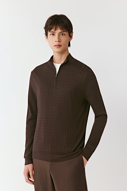 Man wearing a brown textured sweater on a white background