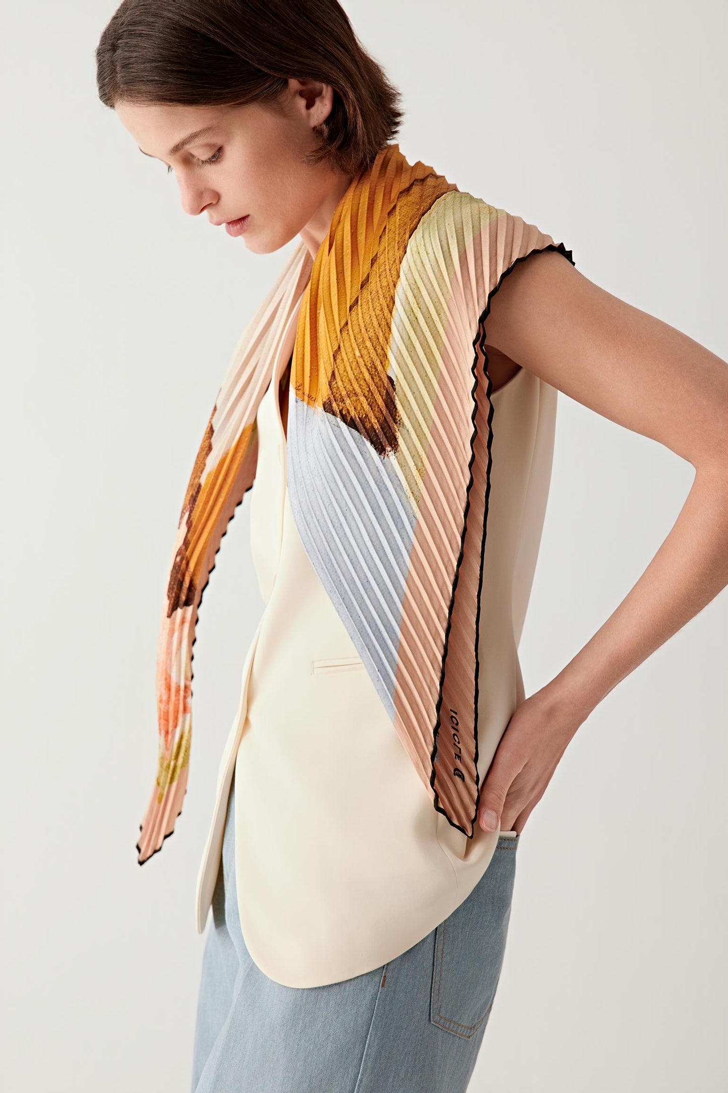 Side view highlighting the artwork composition across the shoulders.