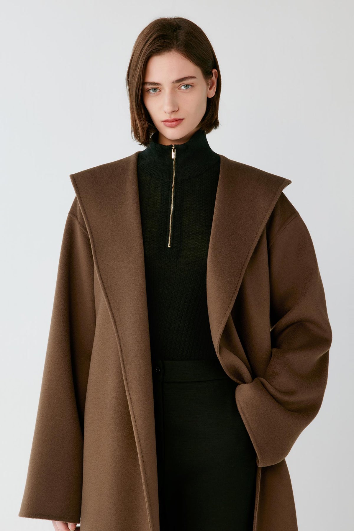 Front close-up highlighting the hood, wrap front and smooth double-face construction of the rich brown coat.