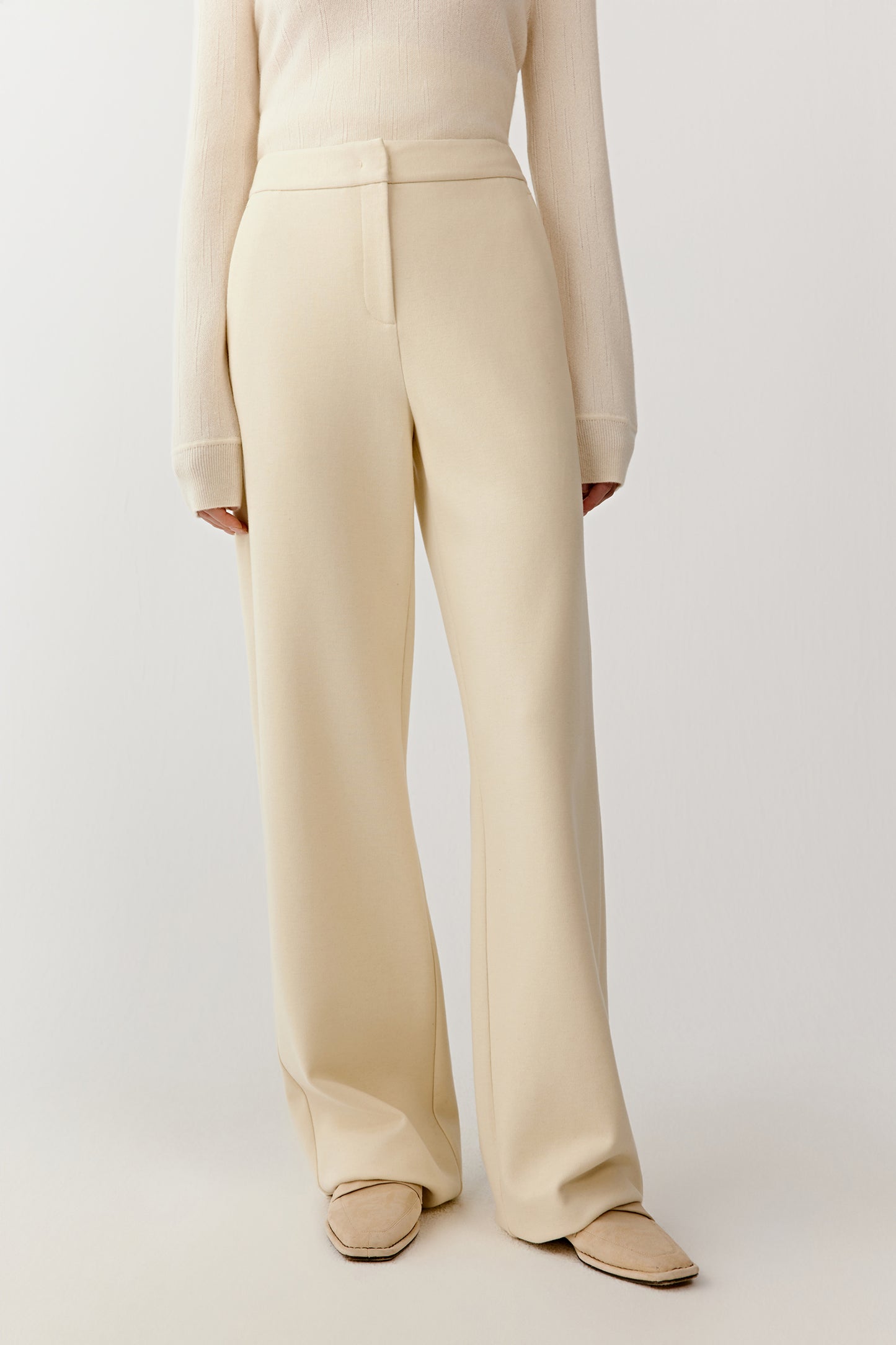 Front view from waist to ankle showing clean lines and a fluid silhouette.