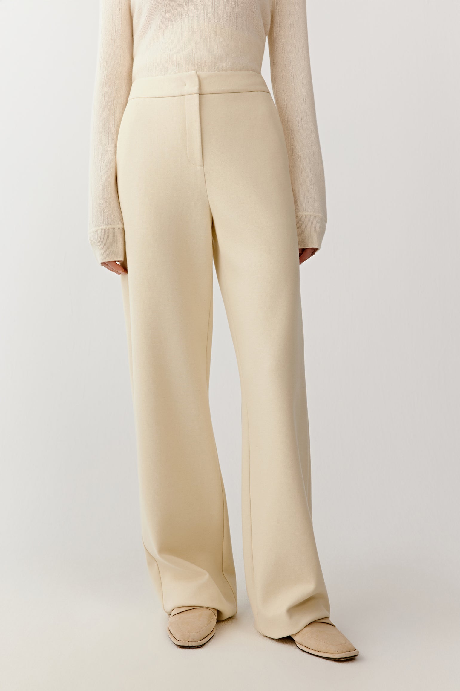 Front view from waist to ankle showing clean lines and a fluid silhouette.