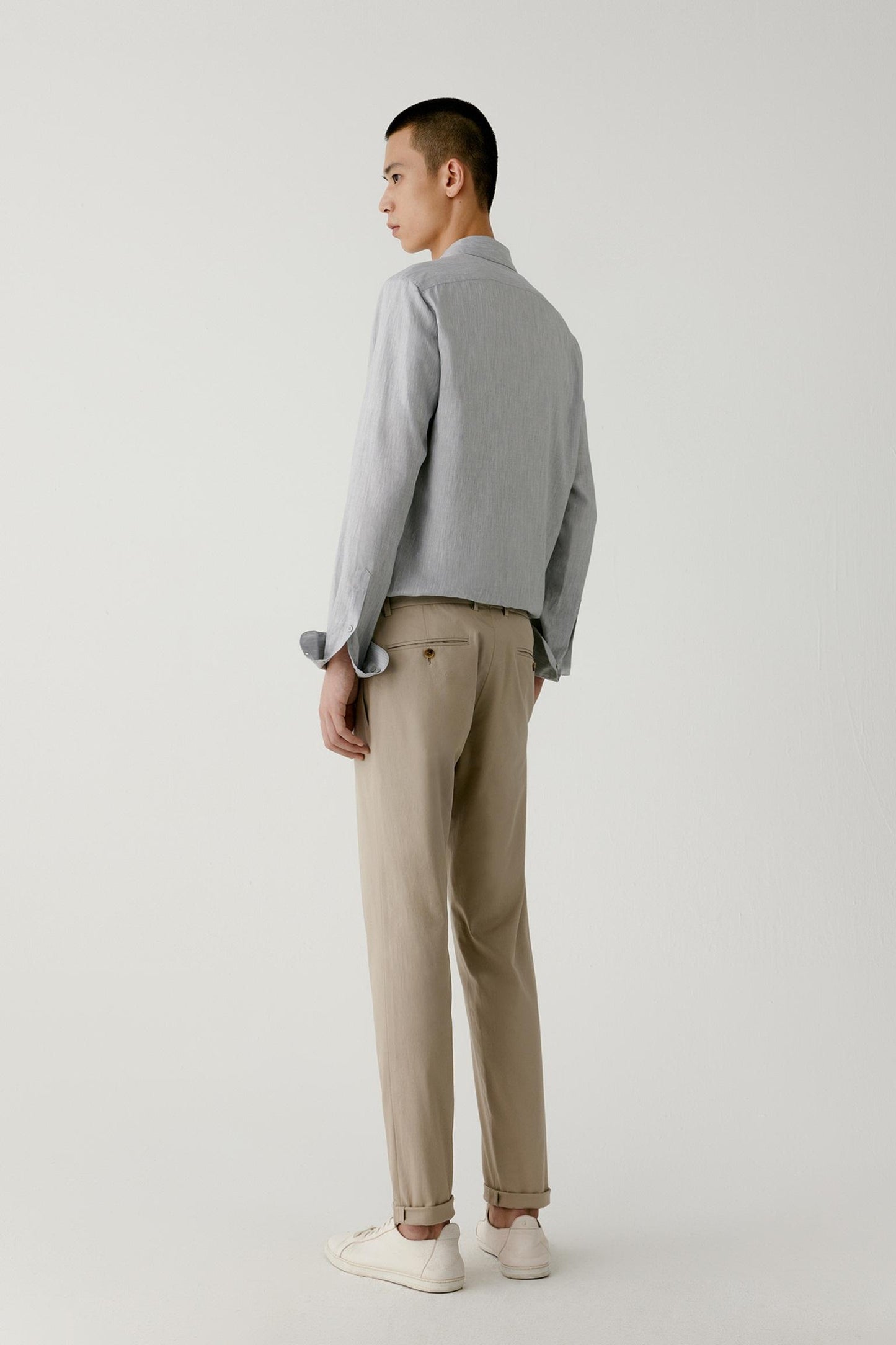 Back view showing the clean straight cut and lightweight cotton structure.