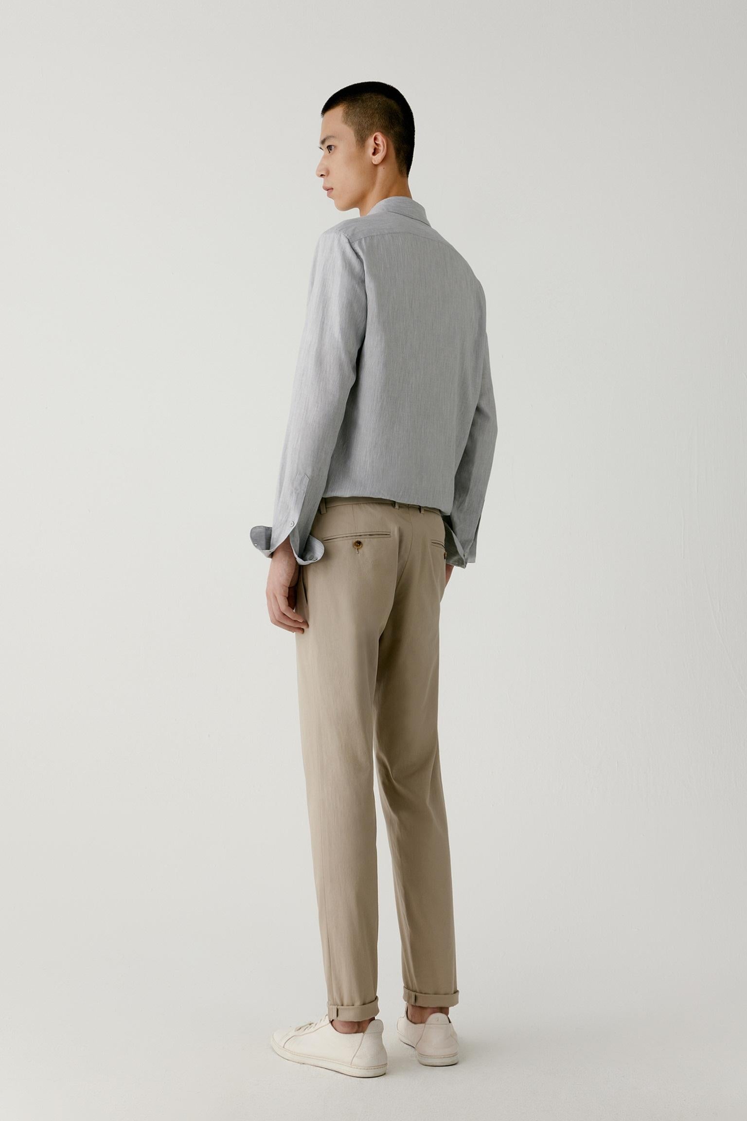 Back view showing the clean straight cut and lightweight cotton structure.
