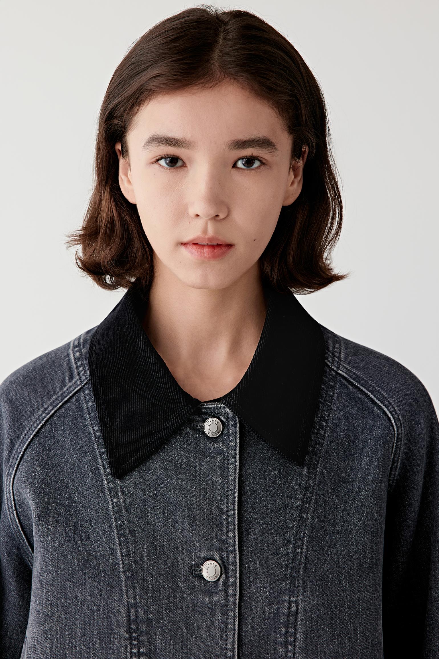 Close-up portrait showing the structured collar and front placket.