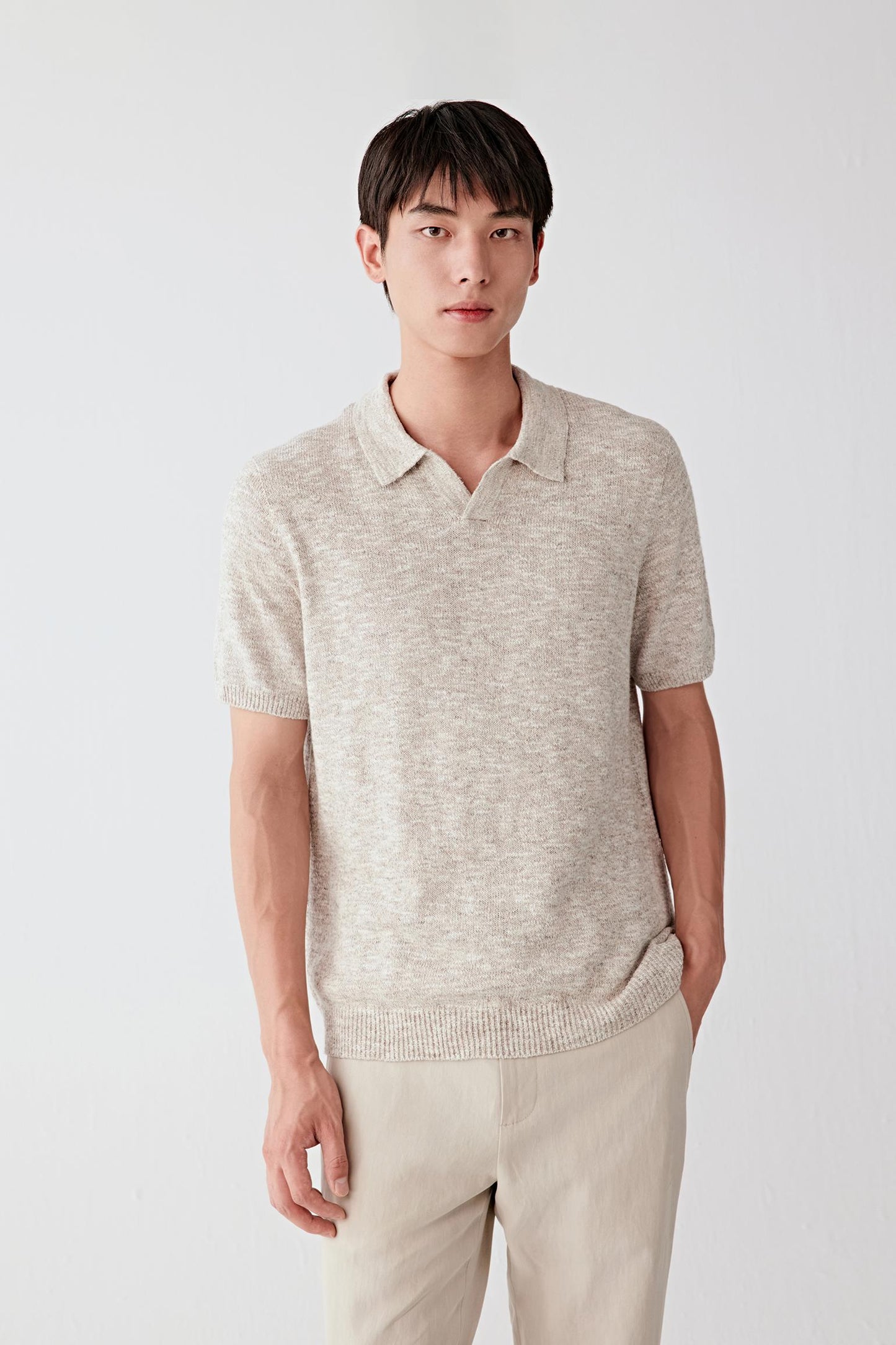 Three-quarter view highlighting the relaxed drape and organic texture.