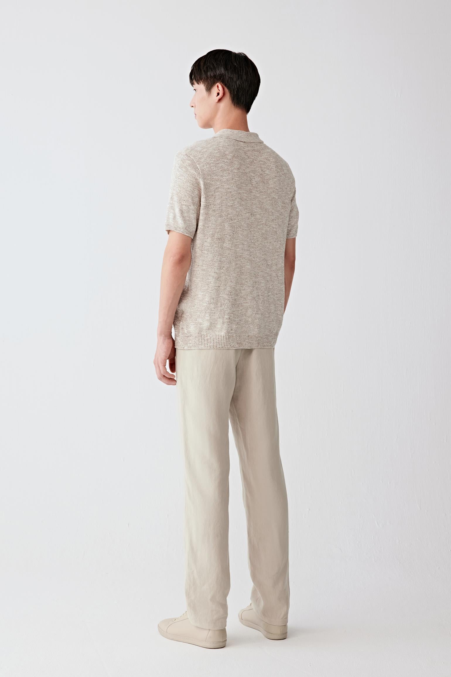 Side view showing the straight hem and clean lines.