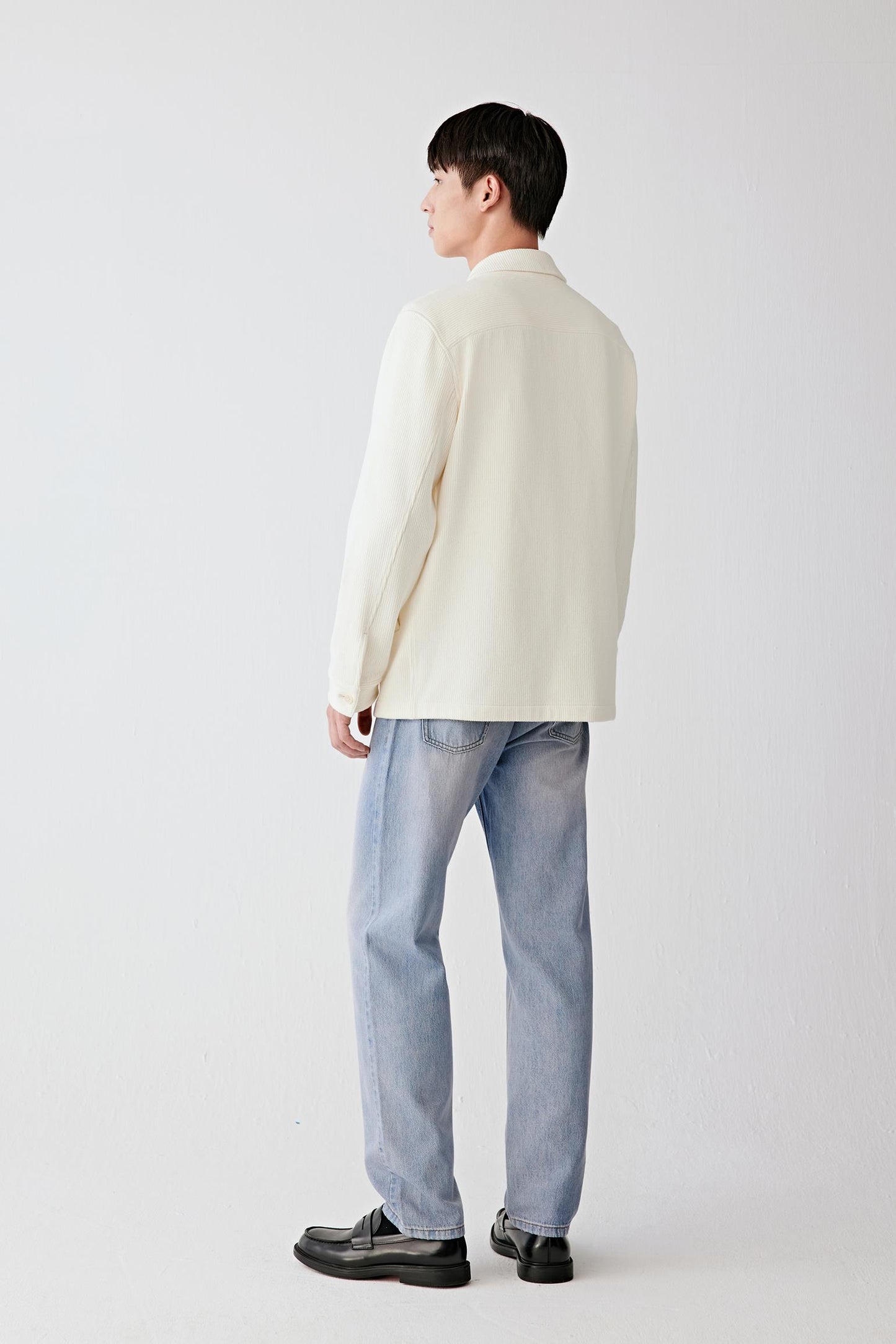 Full-length back view showing a straight hem and minimal back detailing.