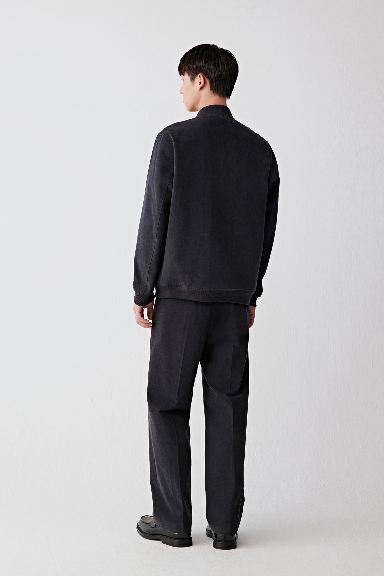 Side view highlighting the straight hem and relaxed fit.