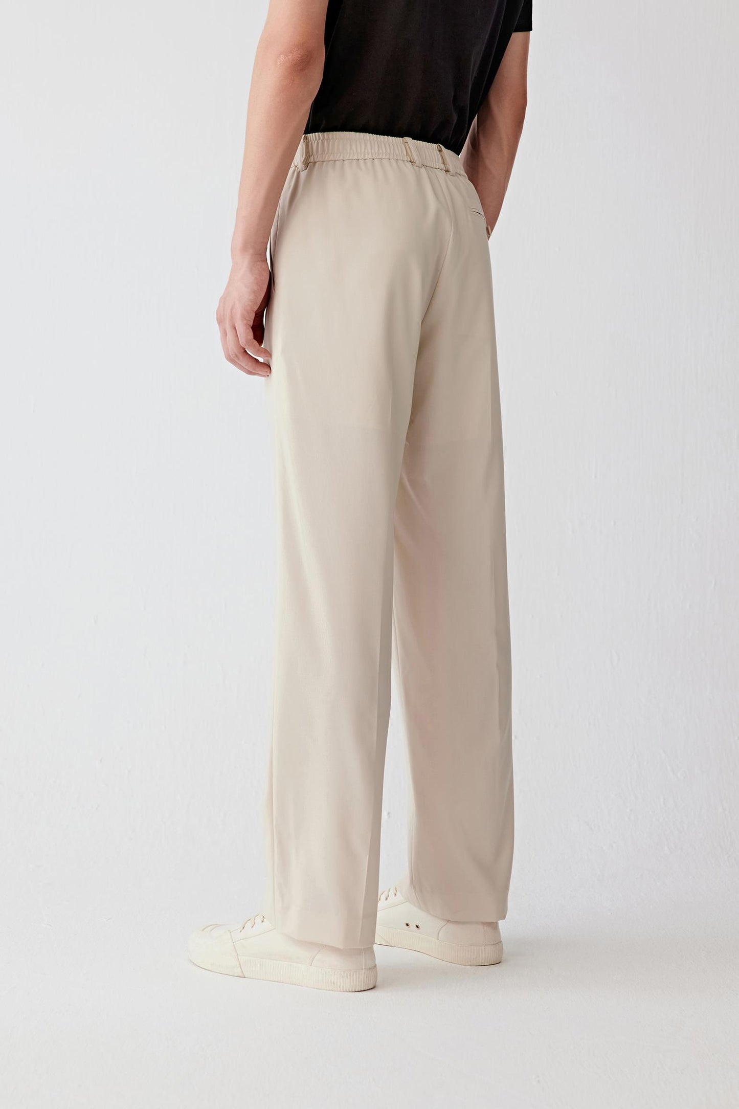 Side profile showing the loose, softly structured silhouette.