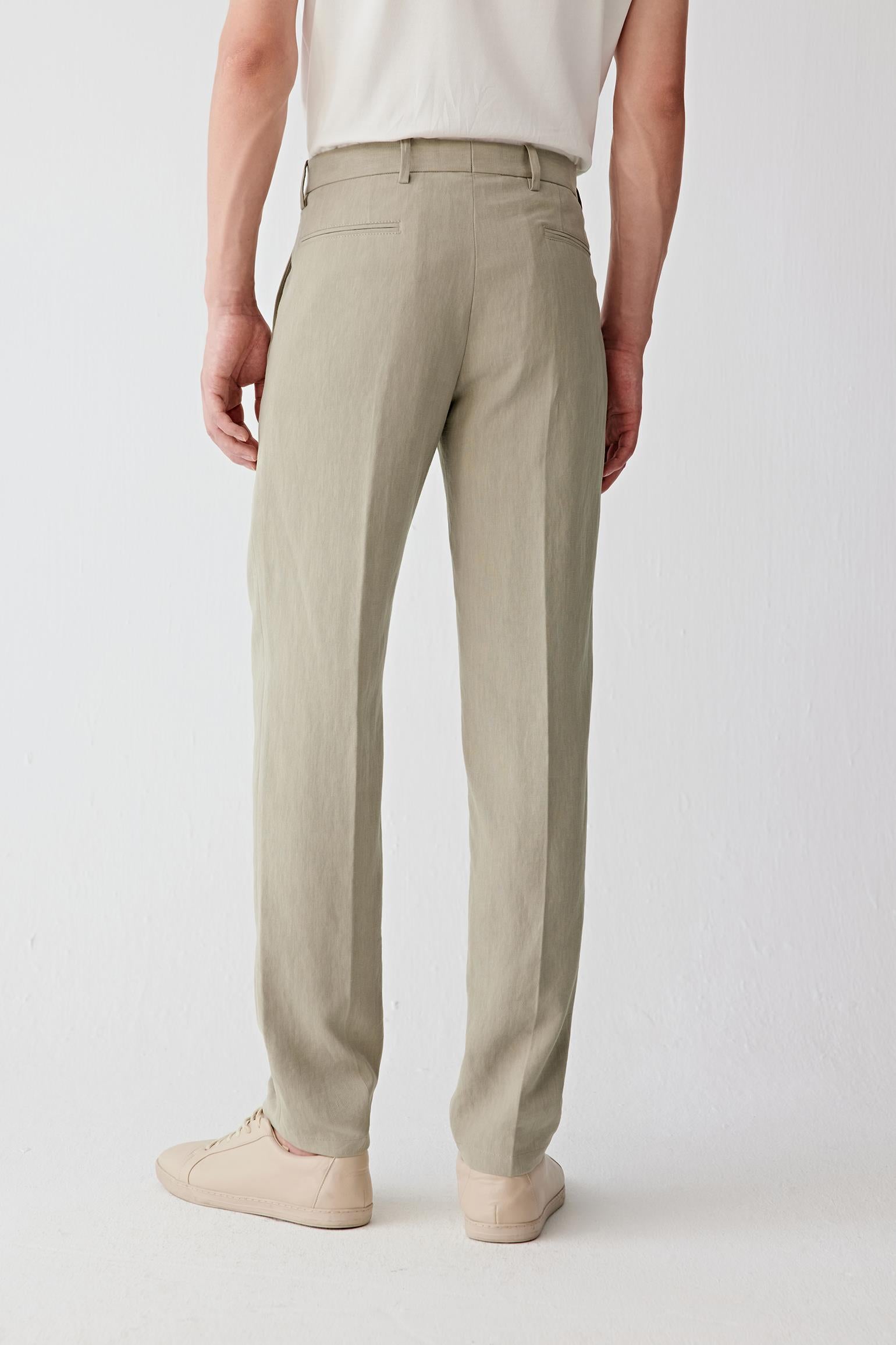 Back view emphasizing the natural ease through the leg and soft movement of the fabric.