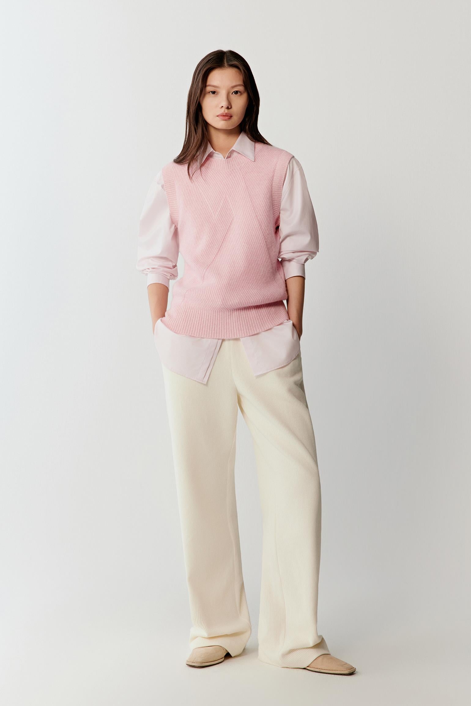 Three-quarter front view showing soft drape and relaxed silhouette.