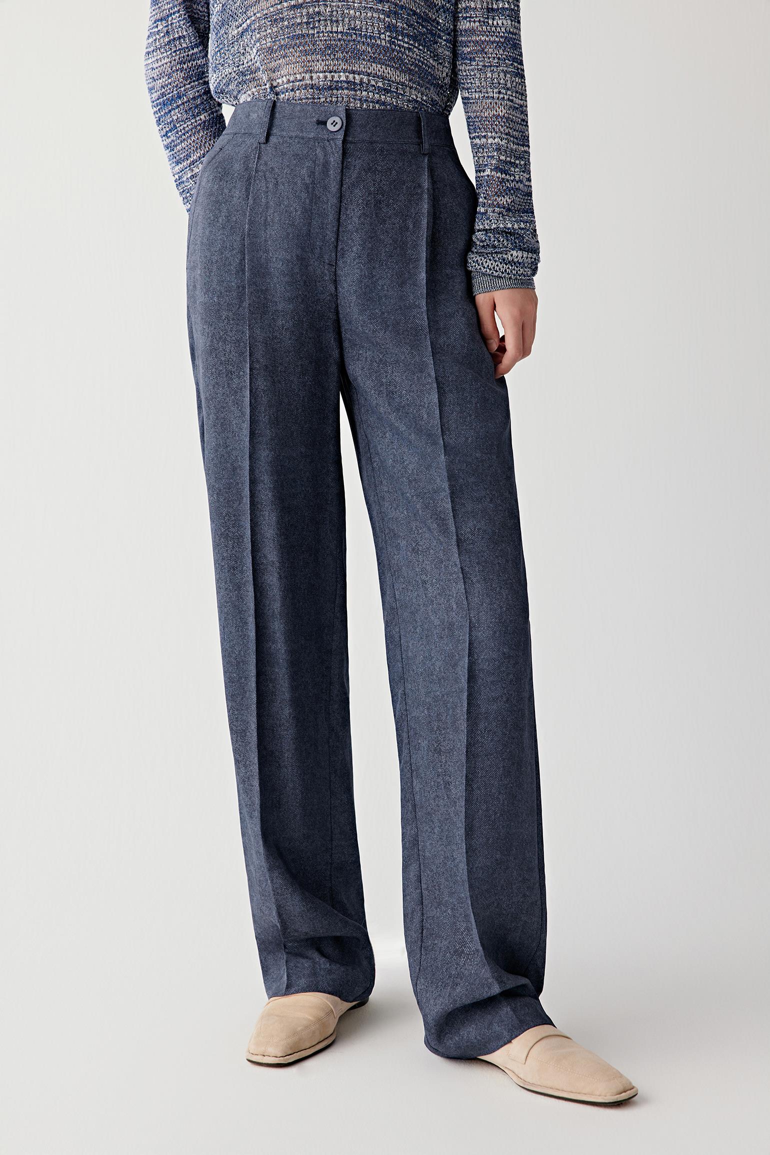 Front view focusing on the leg shape and pressed creases, emphasizing the straight silhouette, soft structure and subtle sheen of the indigo blue silk twill