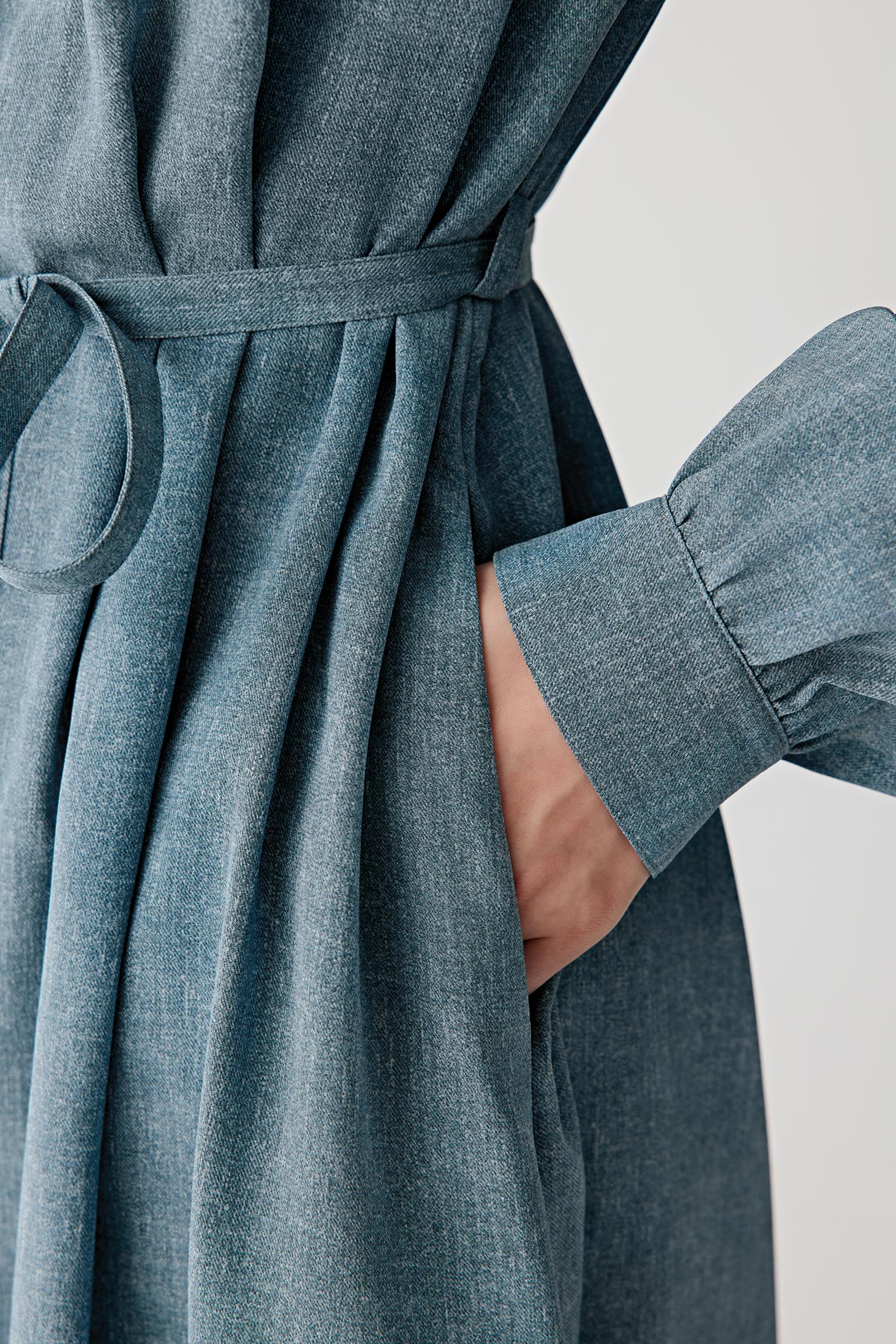 Close-up of sleeve and cuff detailing the wide cuff construction, tonal buttons and visible stitching, highlighting the soft, fluid surface of the fabric