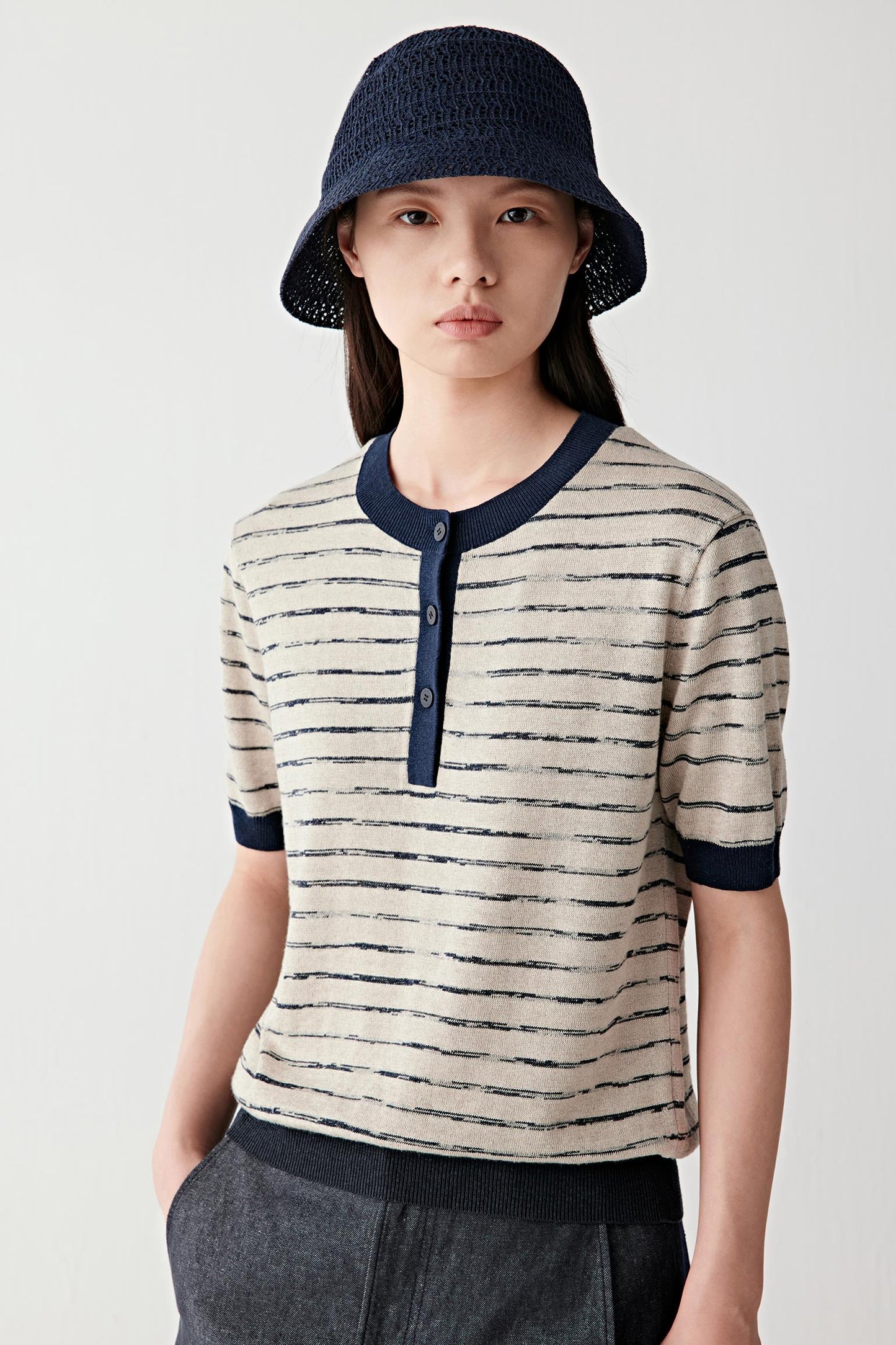 Mid-length front view emphasizing stripe pattern, short sleeves and soft structure