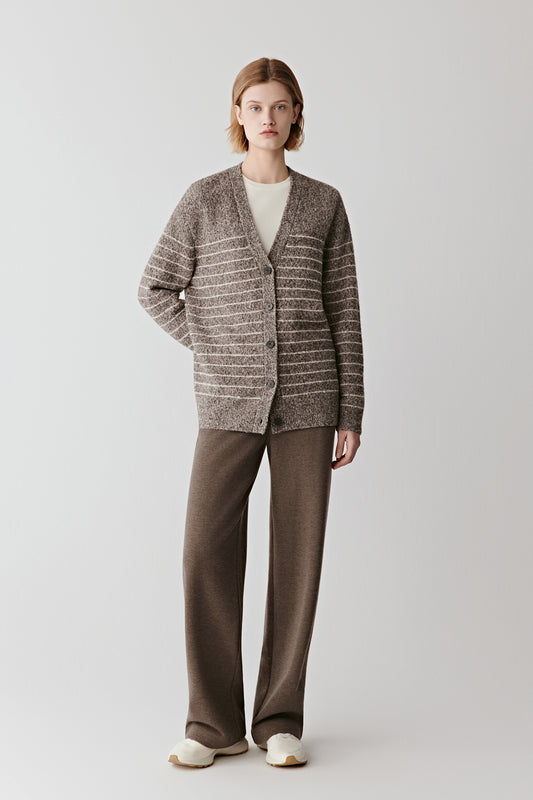 Full-length back view of the striped wool and yak cardigan, showing a straight cut and evenly spaced horizontal stripes.