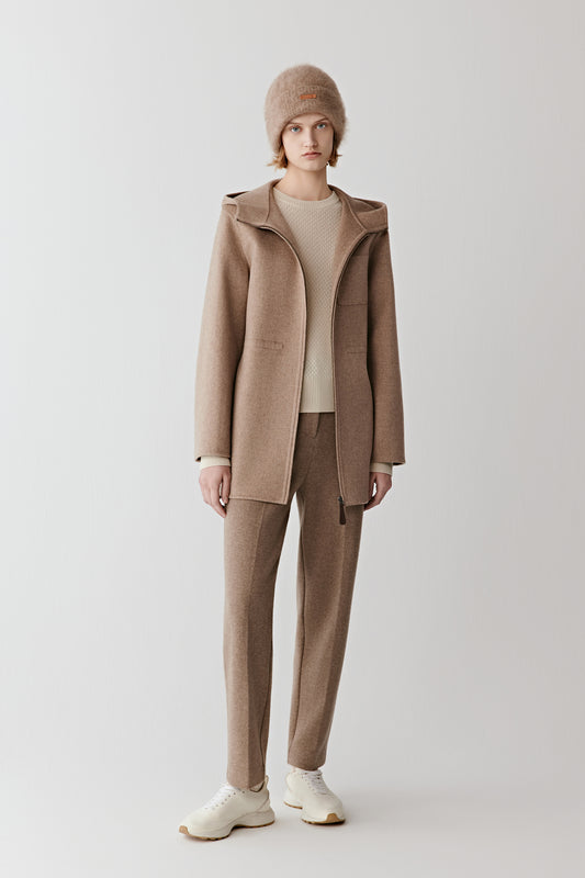 Full-length front view of straight trousers in double-faced wool and cashmere jersey in a natural taupe shade.