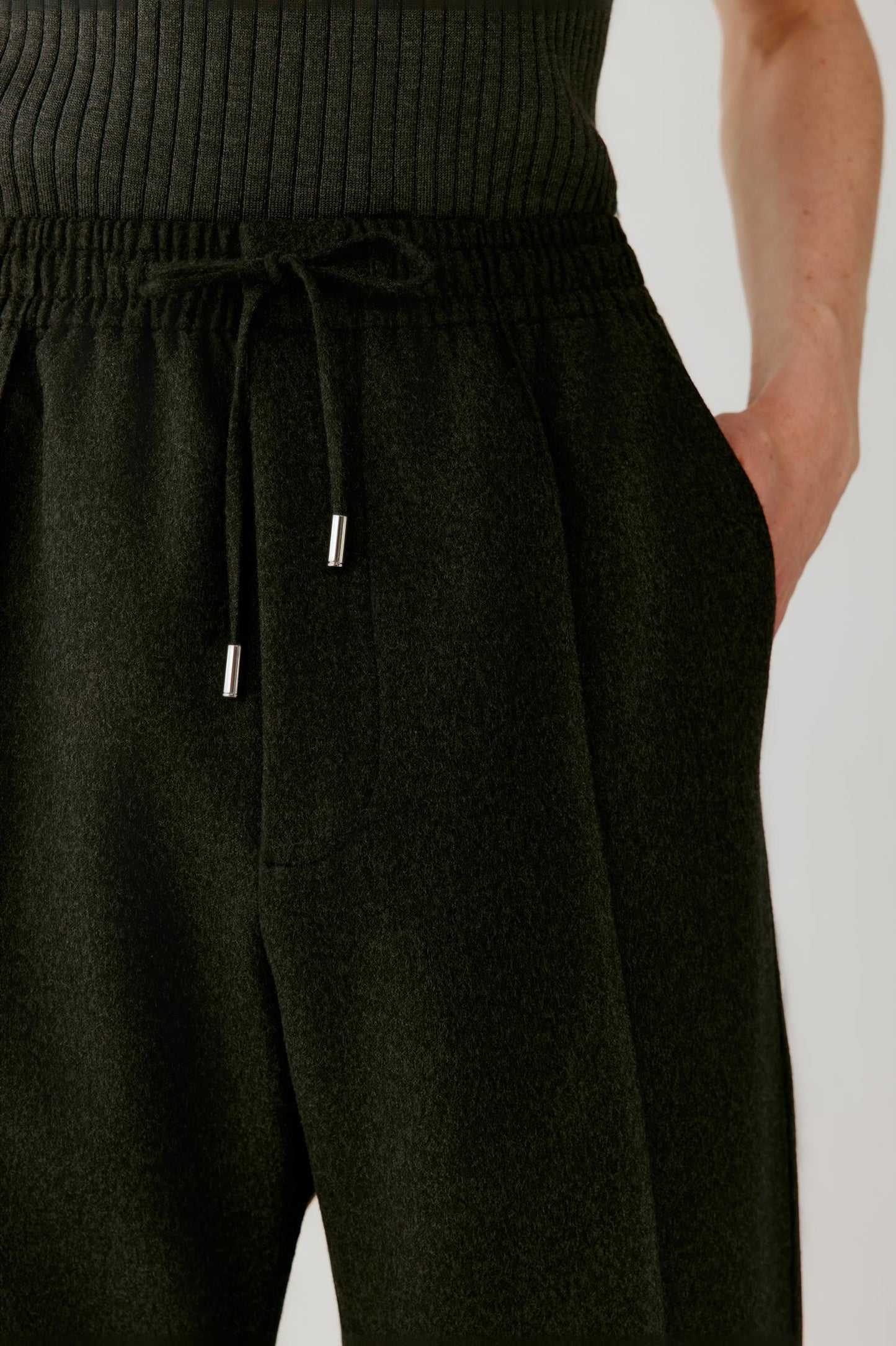 Close-up of the elasticated waistband and adjustable drawstring.