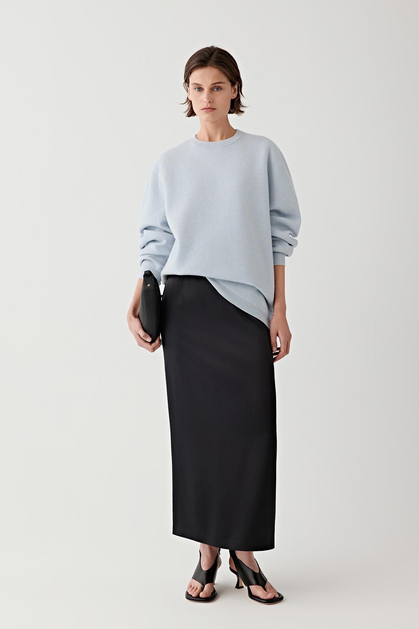 Full-length view of the relaxed silhouette.