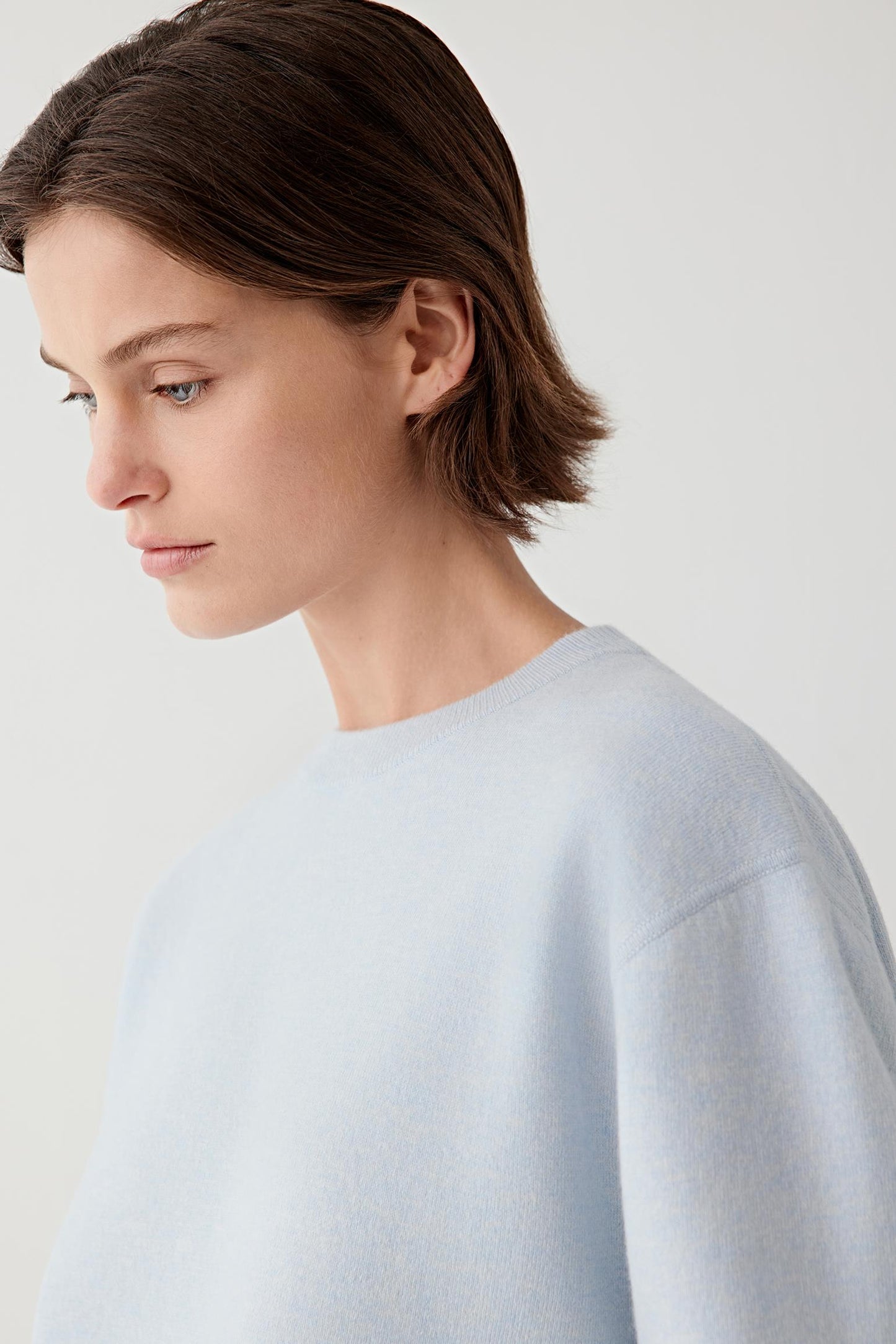 Close-up of the sleeve and knit texture.