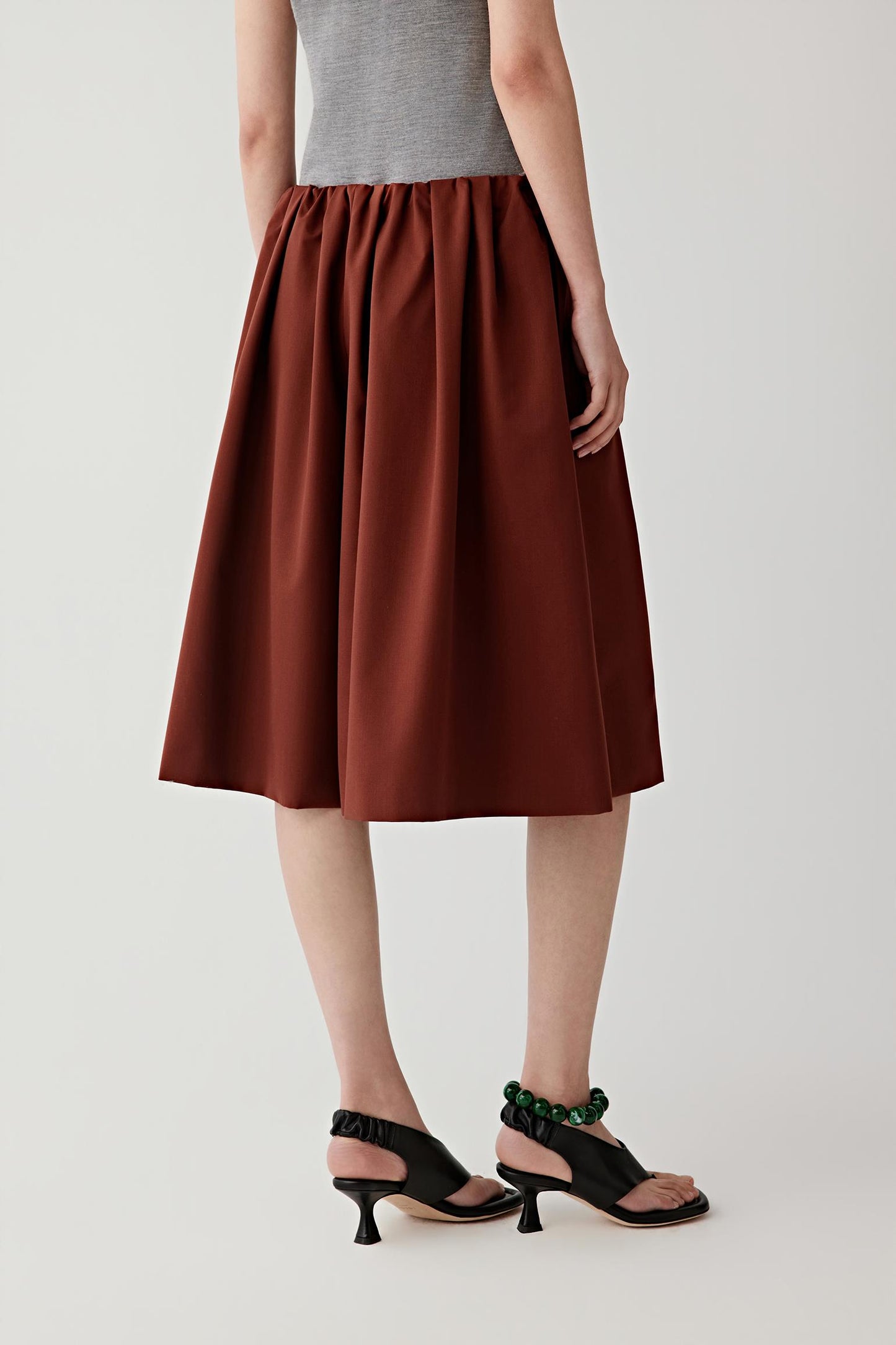 Side view highlighting the flared shape.