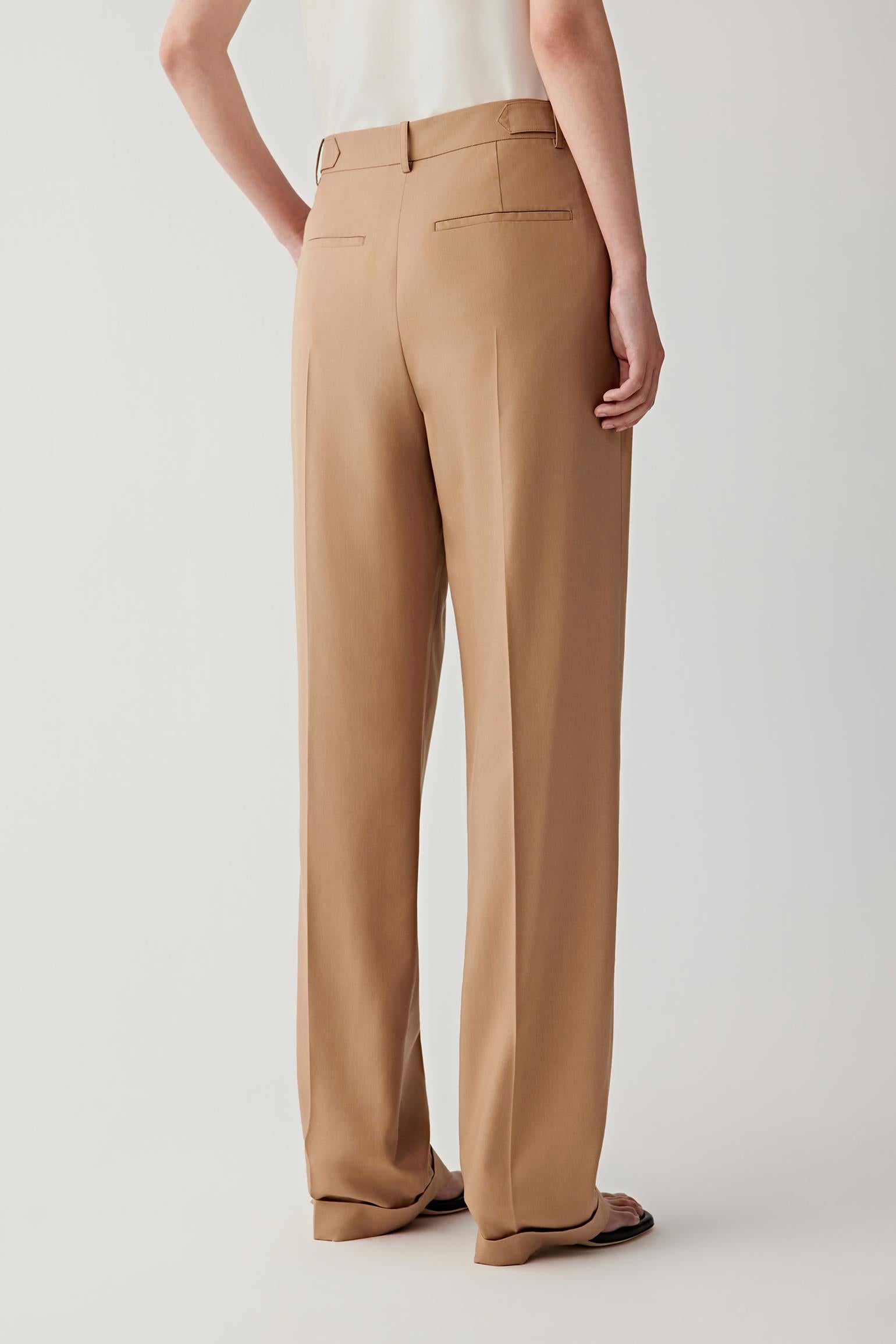 Mid-length side or back view highlighting the clean construction and fluid movement through the leg