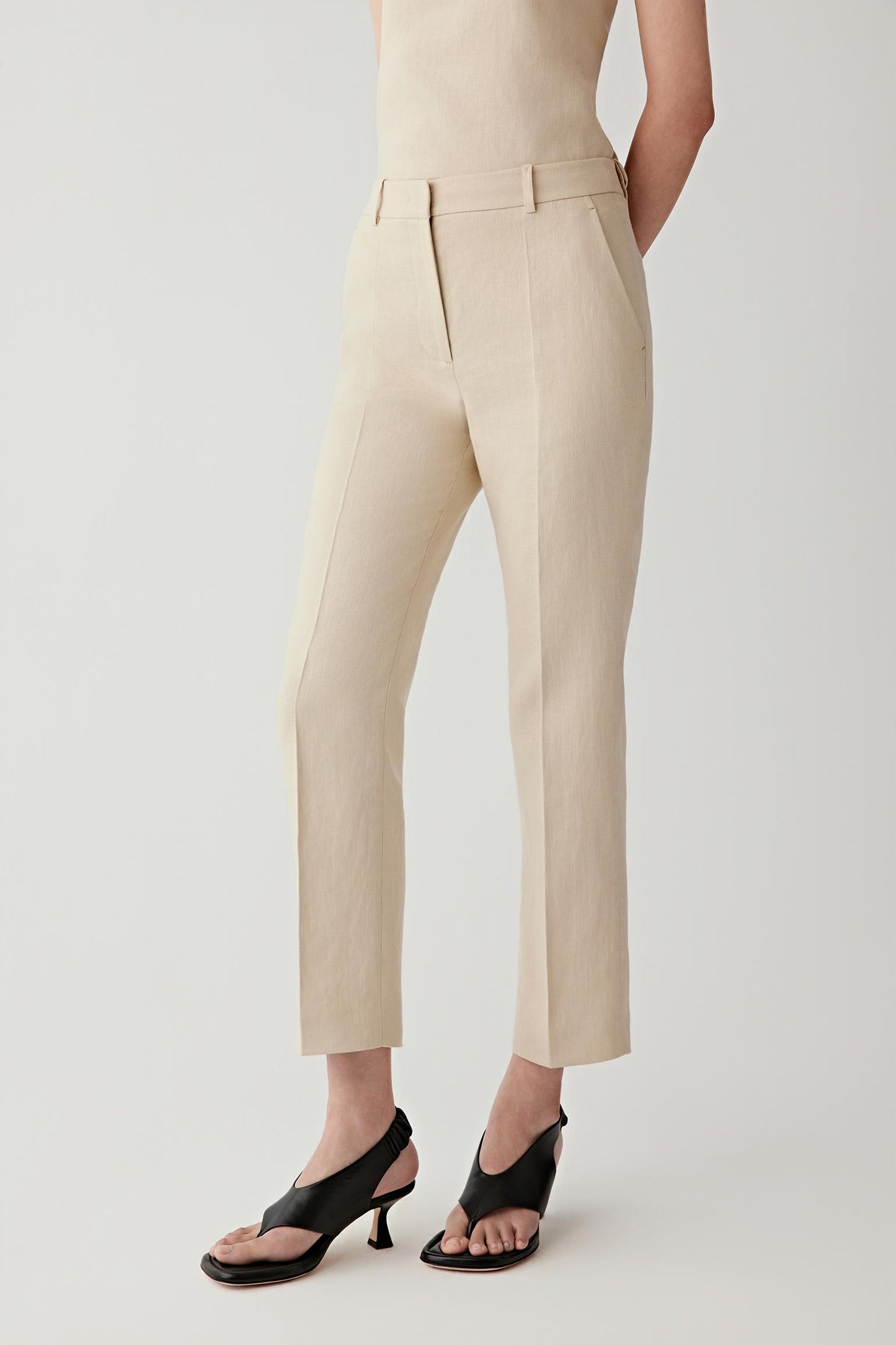 Front view of the bootcut trousers showing the flared leg.
