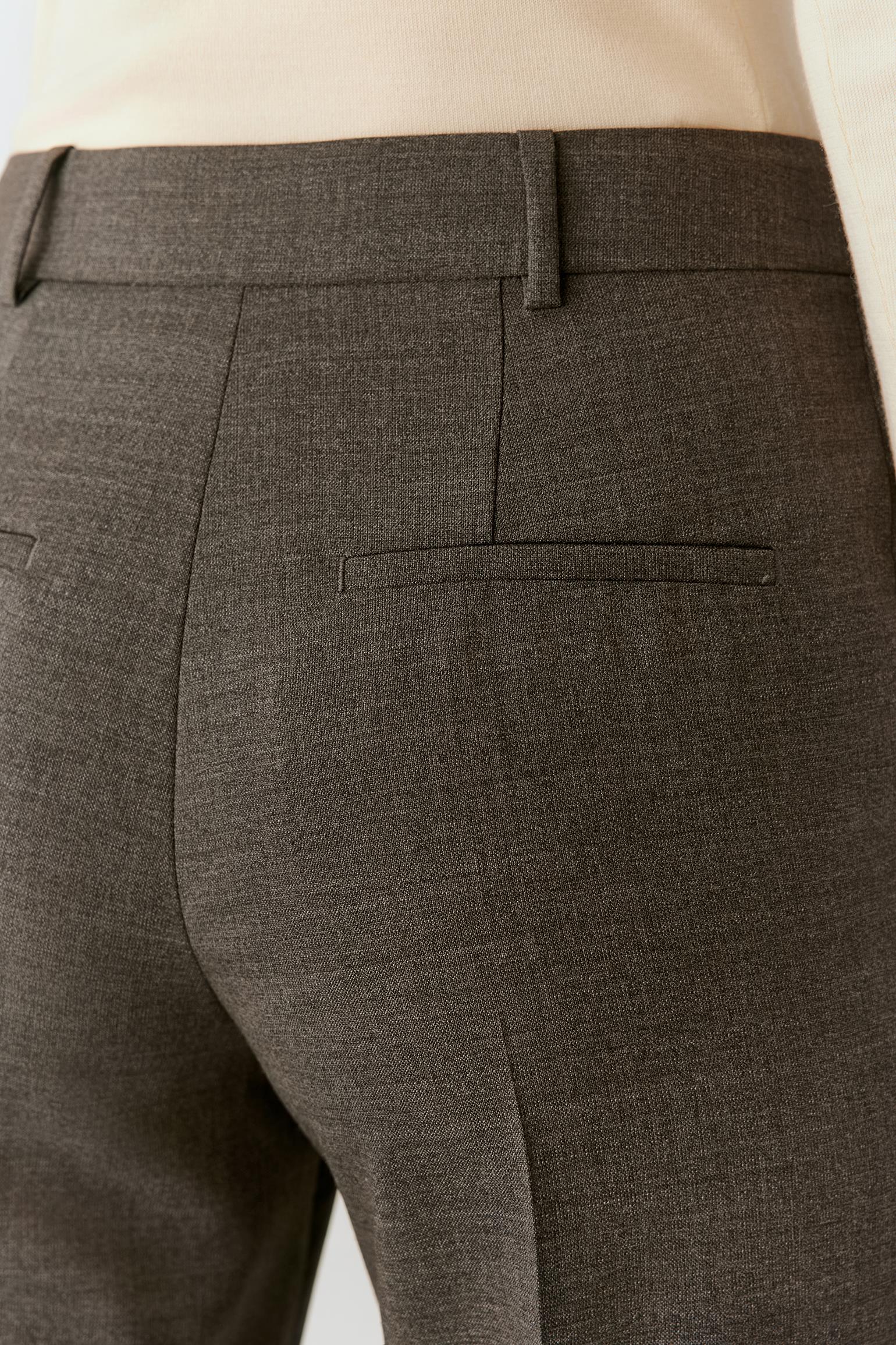Close-up of the back waistband and welt pocket, highlighting the tailored construction and grey melange texture.