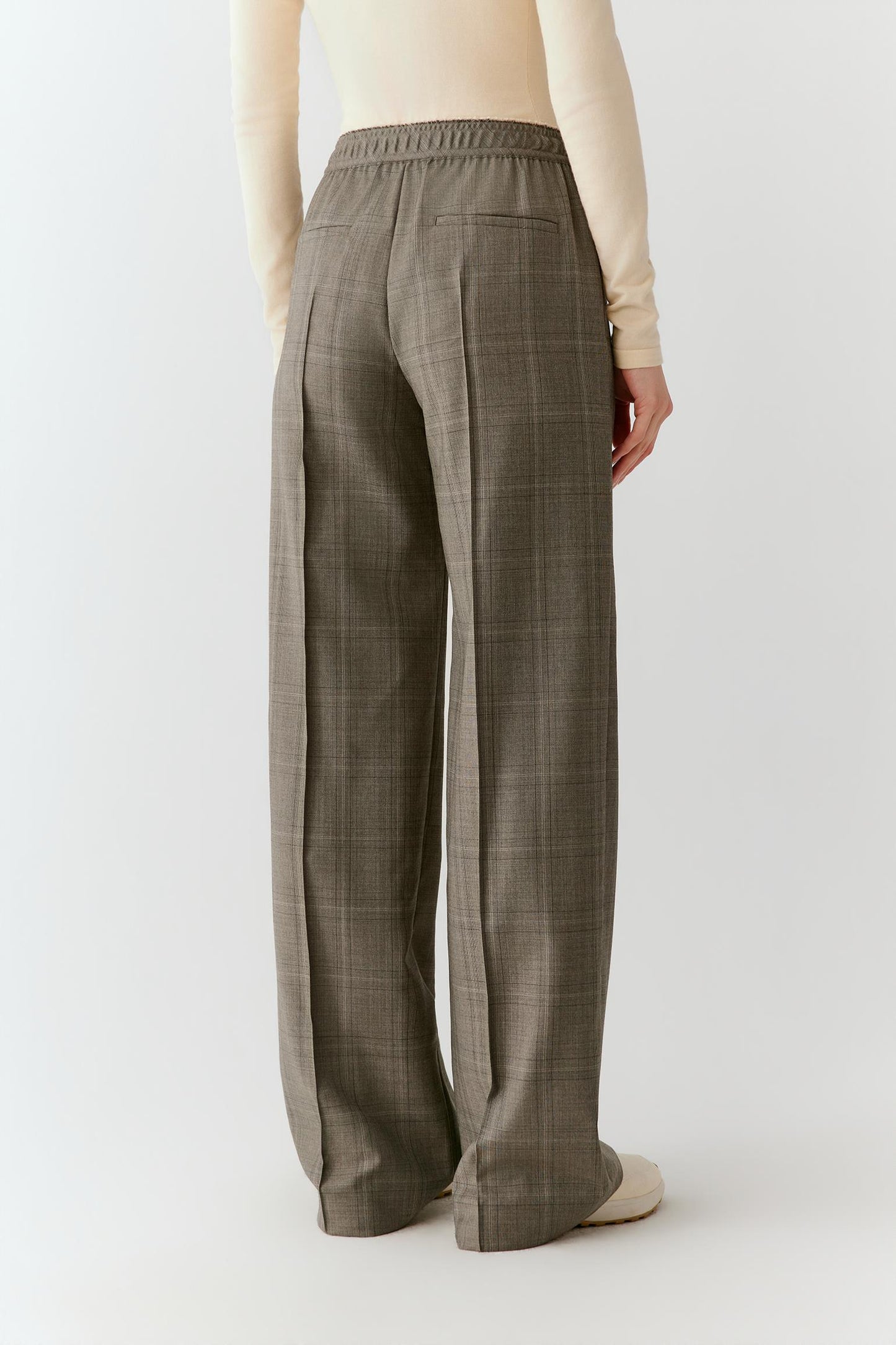 Back view showing the straight-leg silhouette and clean tailored construction.