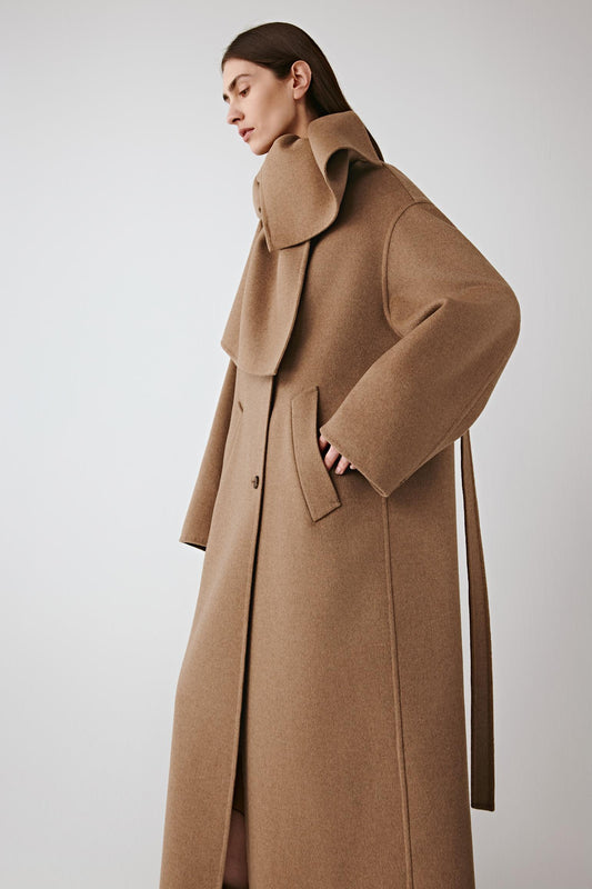 Three-quarter front view highlighting the wide collar and generous panels.
