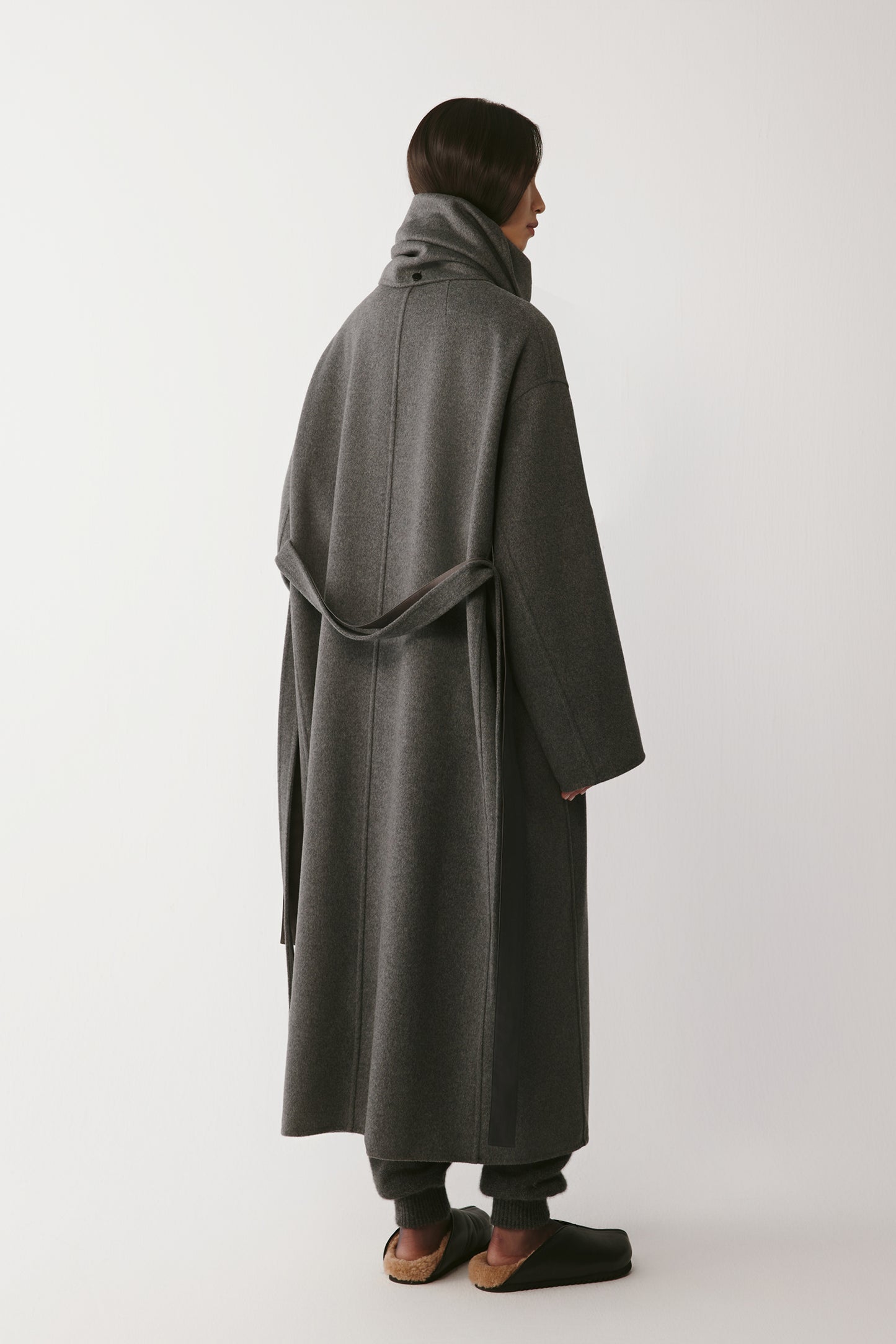 Back view showing the smooth, flowing lines and belt placement.