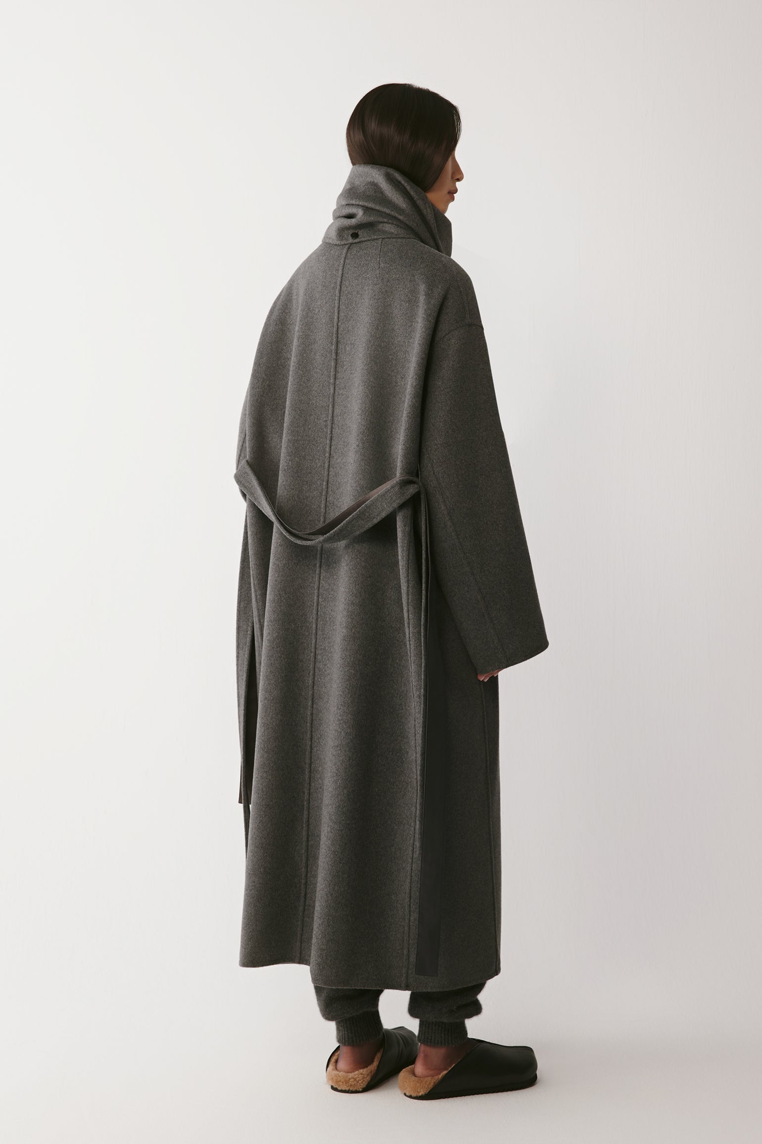 Back view showing the smooth, flowing lines and belt placement.