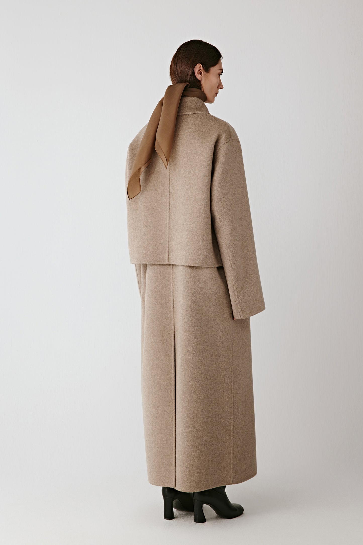Back view showing smooth drape and subtle movement.