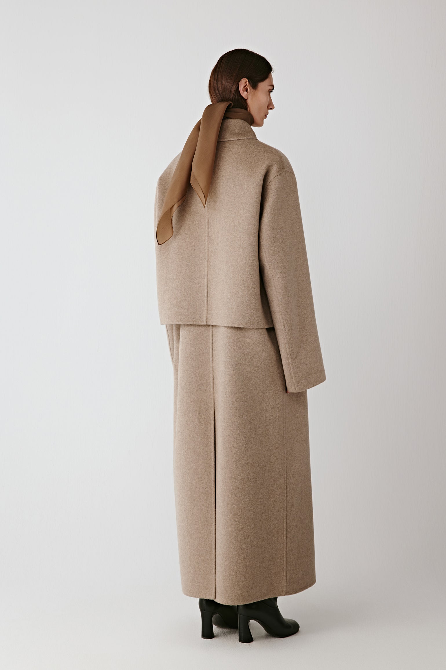 Back view showing smooth drape and subtle movement.
