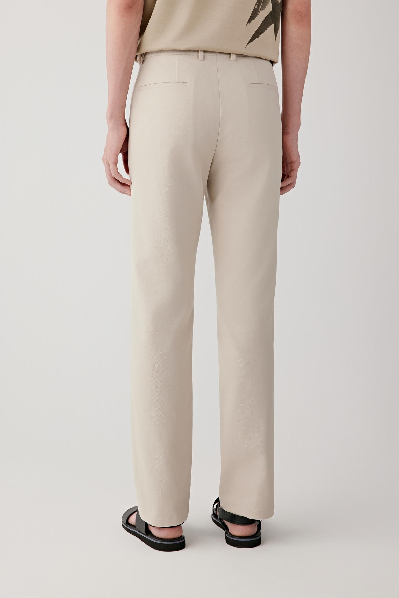 Back view showing the tailored fit and rear pocket detailing.