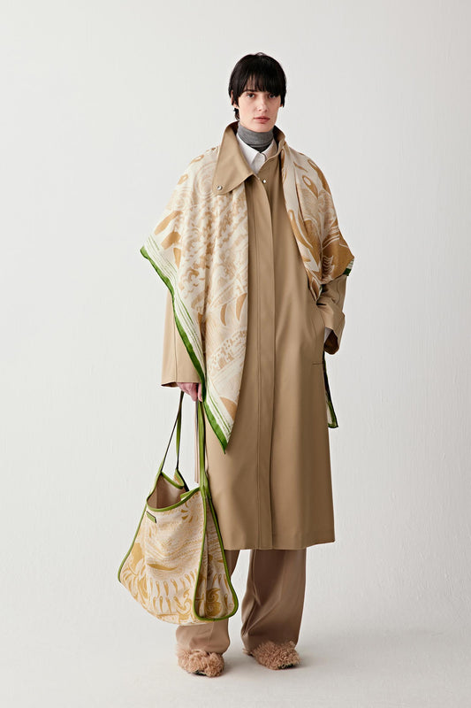 Full-length view showing the oversized tote bag with graphic tiger print, emphasizing the lightweight fabric and generous volume.