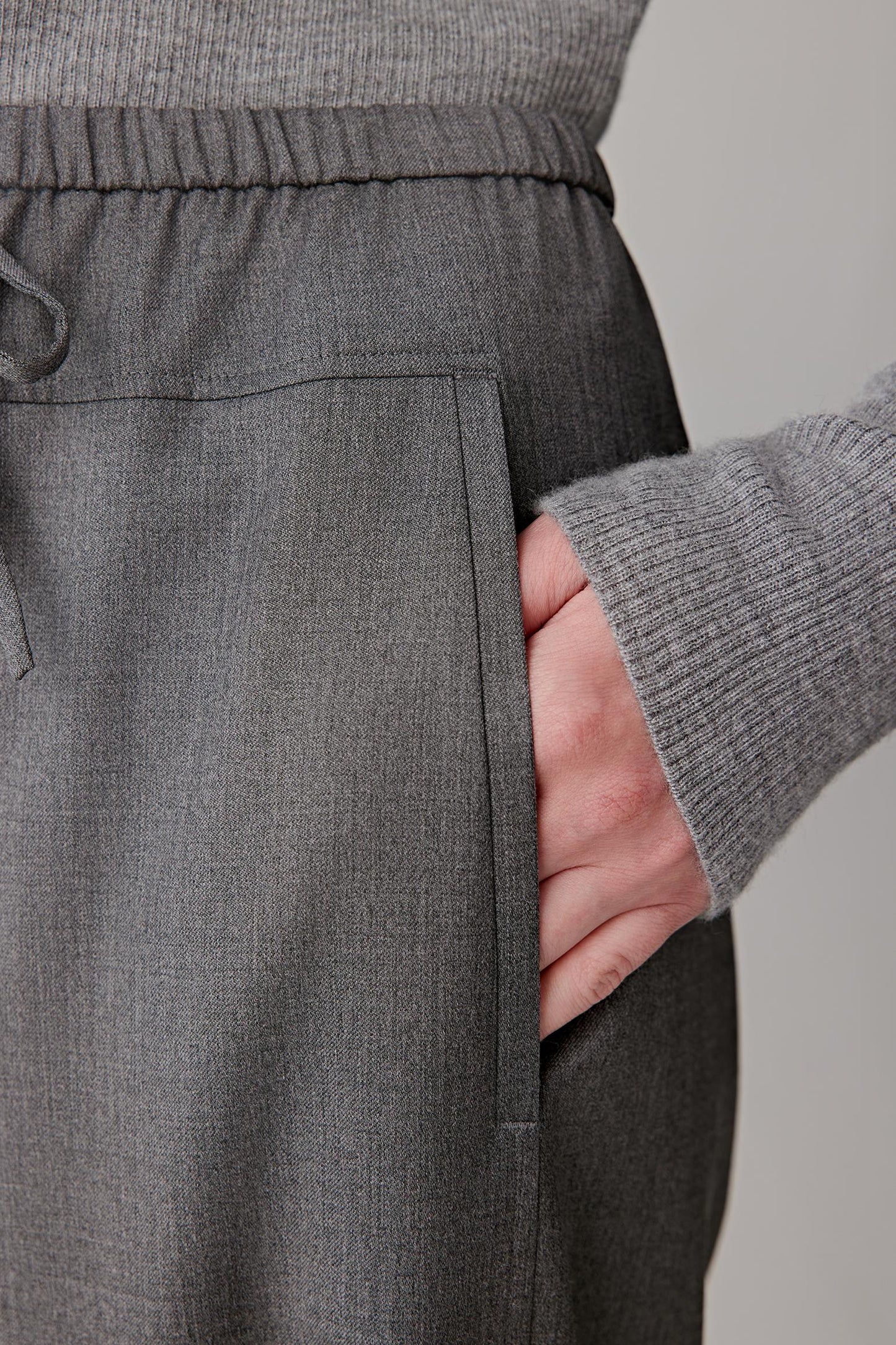 Detail of the side pocket and twill fabric texture.