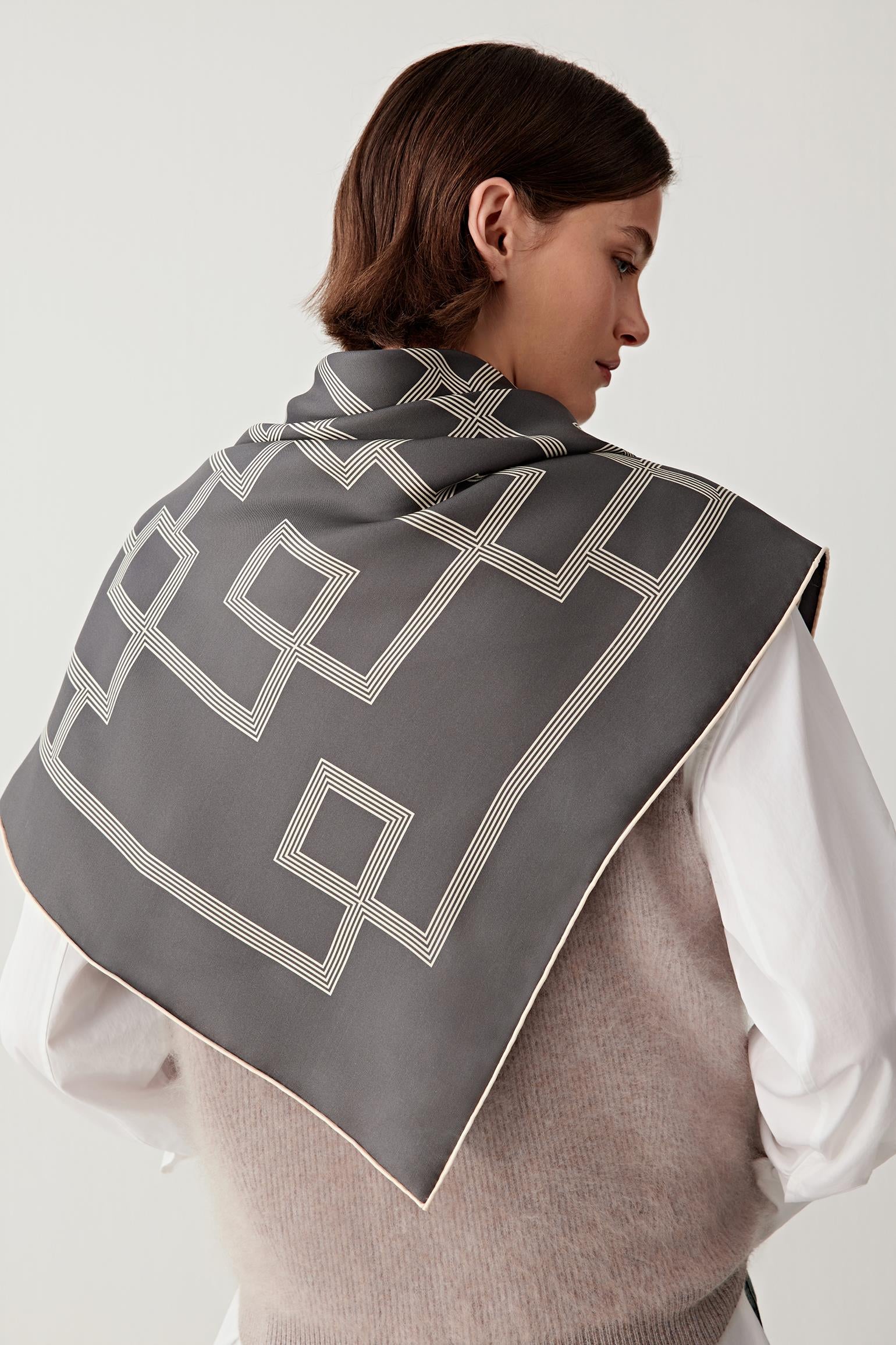 Back view highlighting the geometric motif across the back.