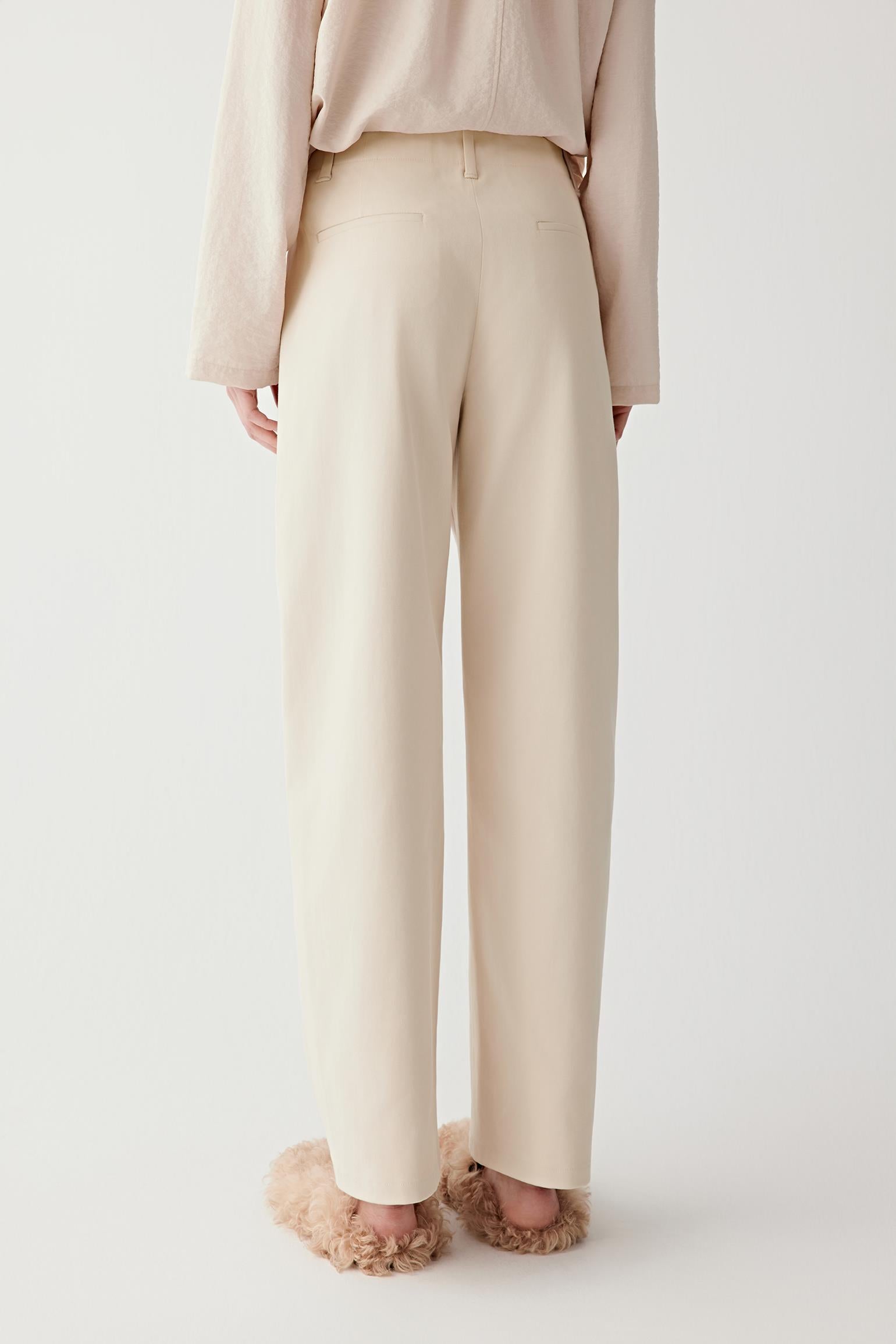 Mid-length front view highlighting straight leg and smooth fabric surface