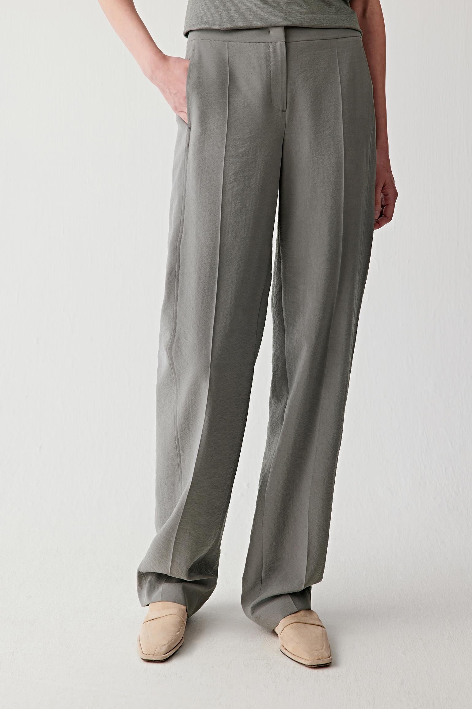 Front or three-quarter view emphasizing the straight silhouette and pressed creases, showing the structured fall of the seersucker fabric