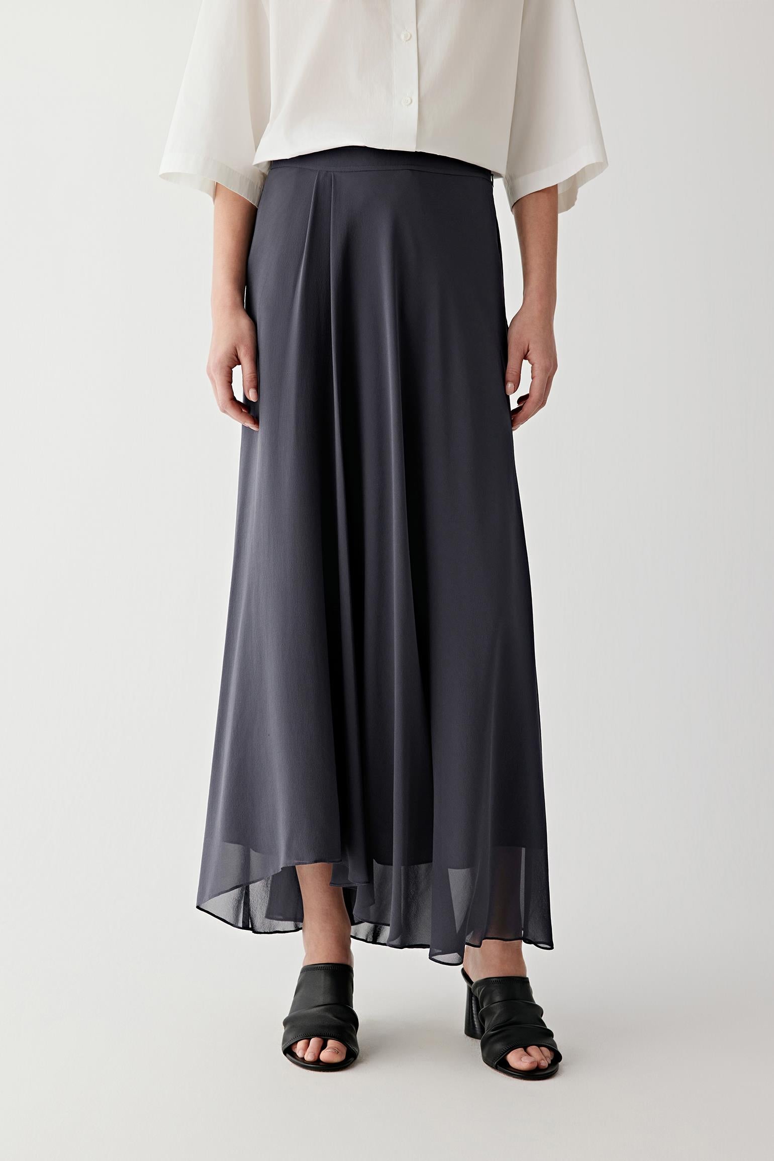 Front or three-quarter view emphasizing the flared silhouette and layered construction, showing the movement and airy quality of the georgette fabric