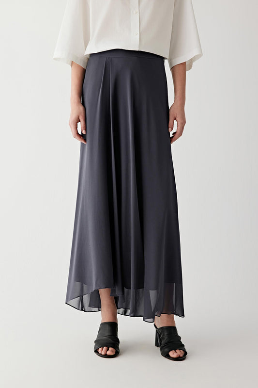 Front or three-quarter view emphasizing the flared silhouette and layered construction, showing the movement and airy quality of the georgette fabric