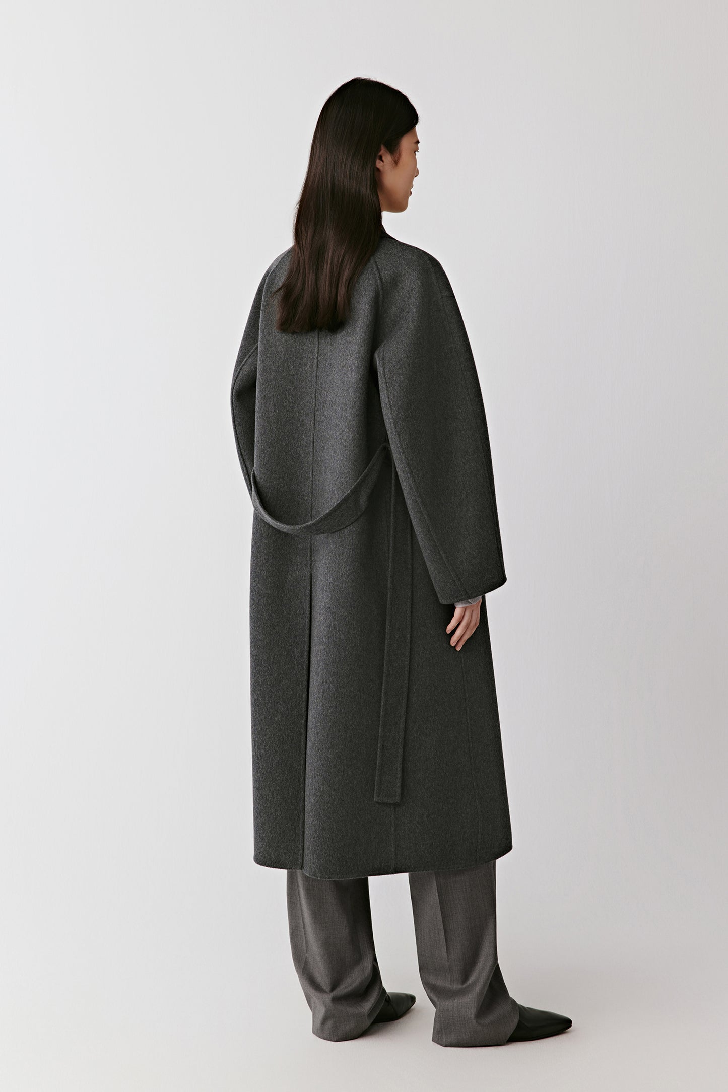 Three-quarter back view showing the fluid drape and soft construction.