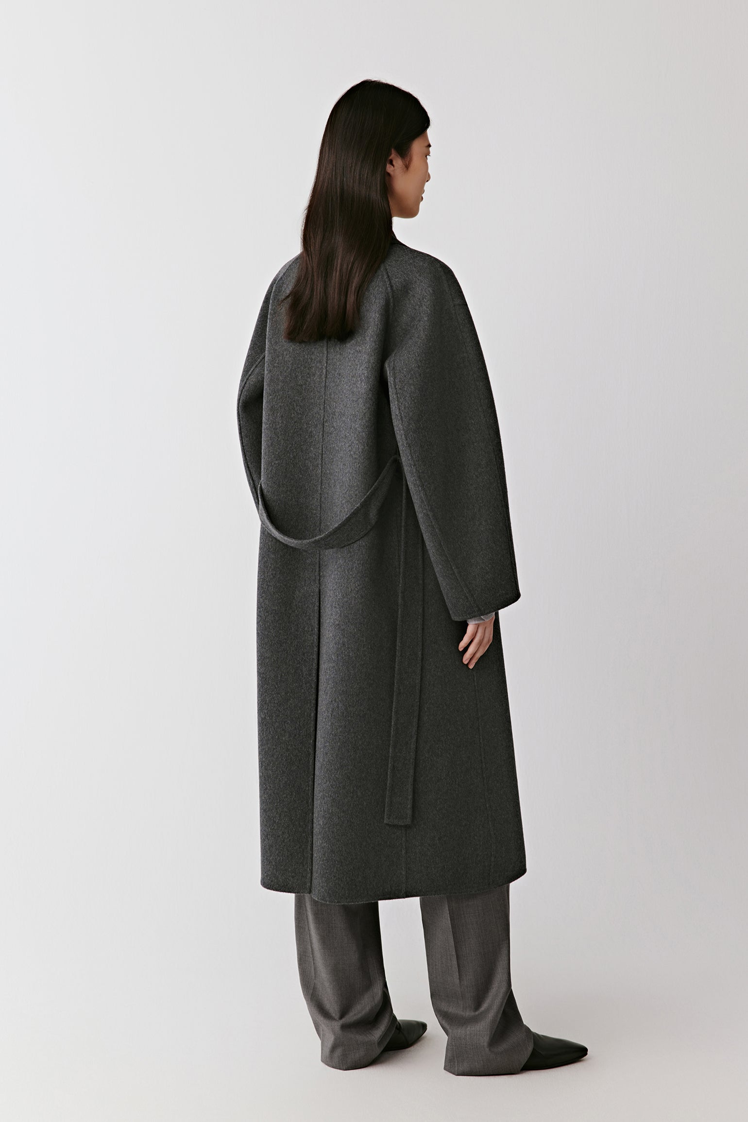 Three-quarter back view showing the fluid drape and soft construction.