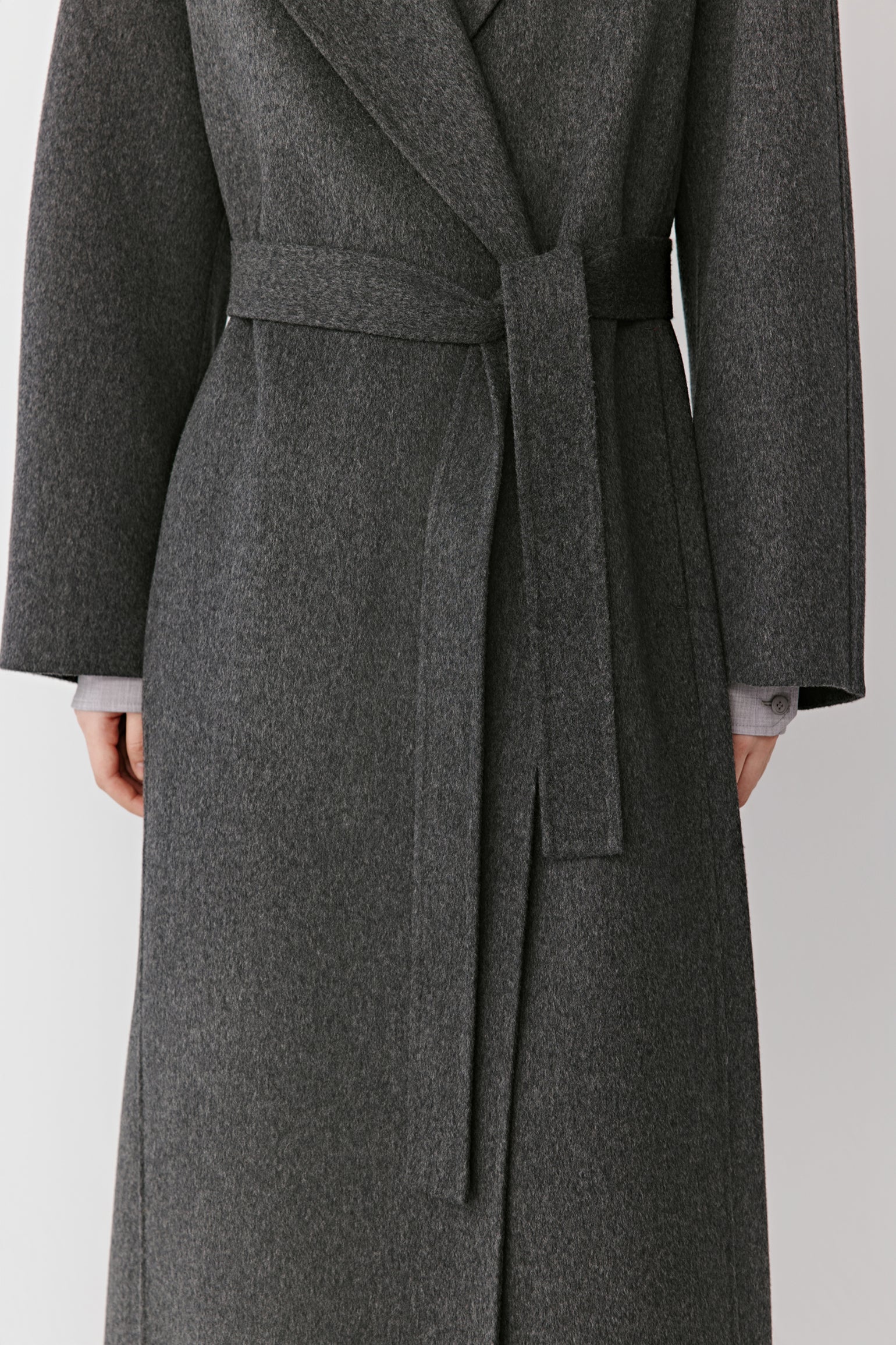 Front view highlighting the self belt and natural flow of the fabric.