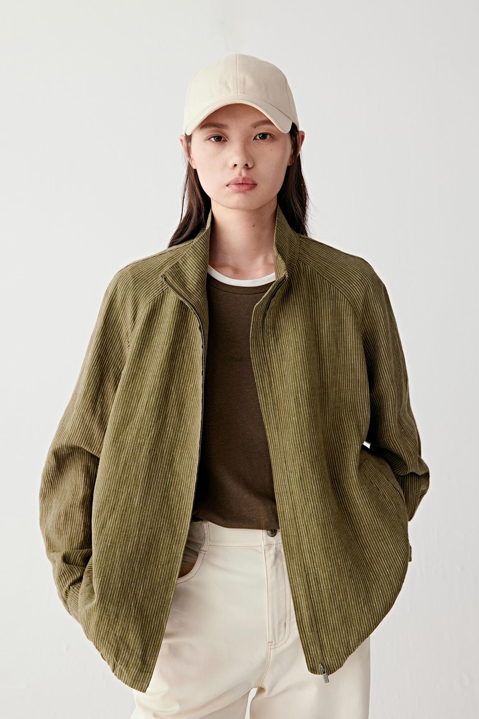 Video showing walking movement, highlighting breathability of linen, soft structure and relaxed silhouette