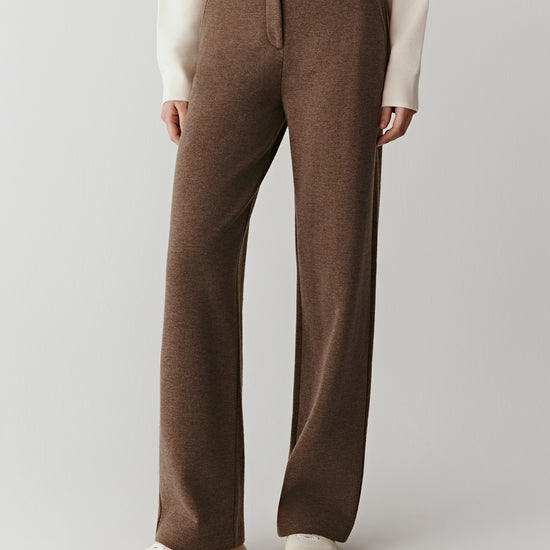 Product video showing straight-leg trousers in brushed wool, cashmere and cotton jersey, rotating to display the fit, fluid drape, waistband, pockets, and overall silhouette from all angles.