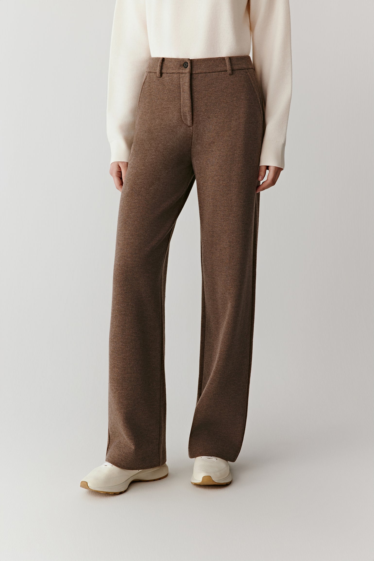 Product video showing straight-leg trousers in brushed wool, cashmere and cotton jersey, rotating to display the fit, fluid drape, waistband, pockets, and overall silhouette from all angles.